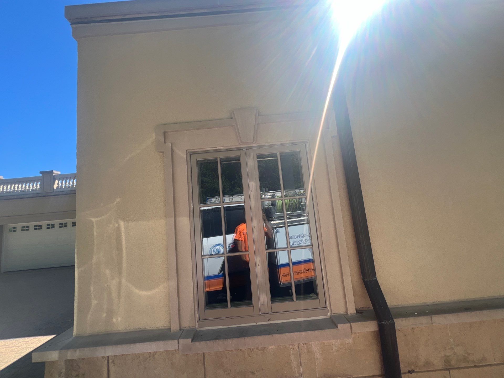 concrete cleaning using Algaecide, soft wash soap by Northern Power Washing LLC.