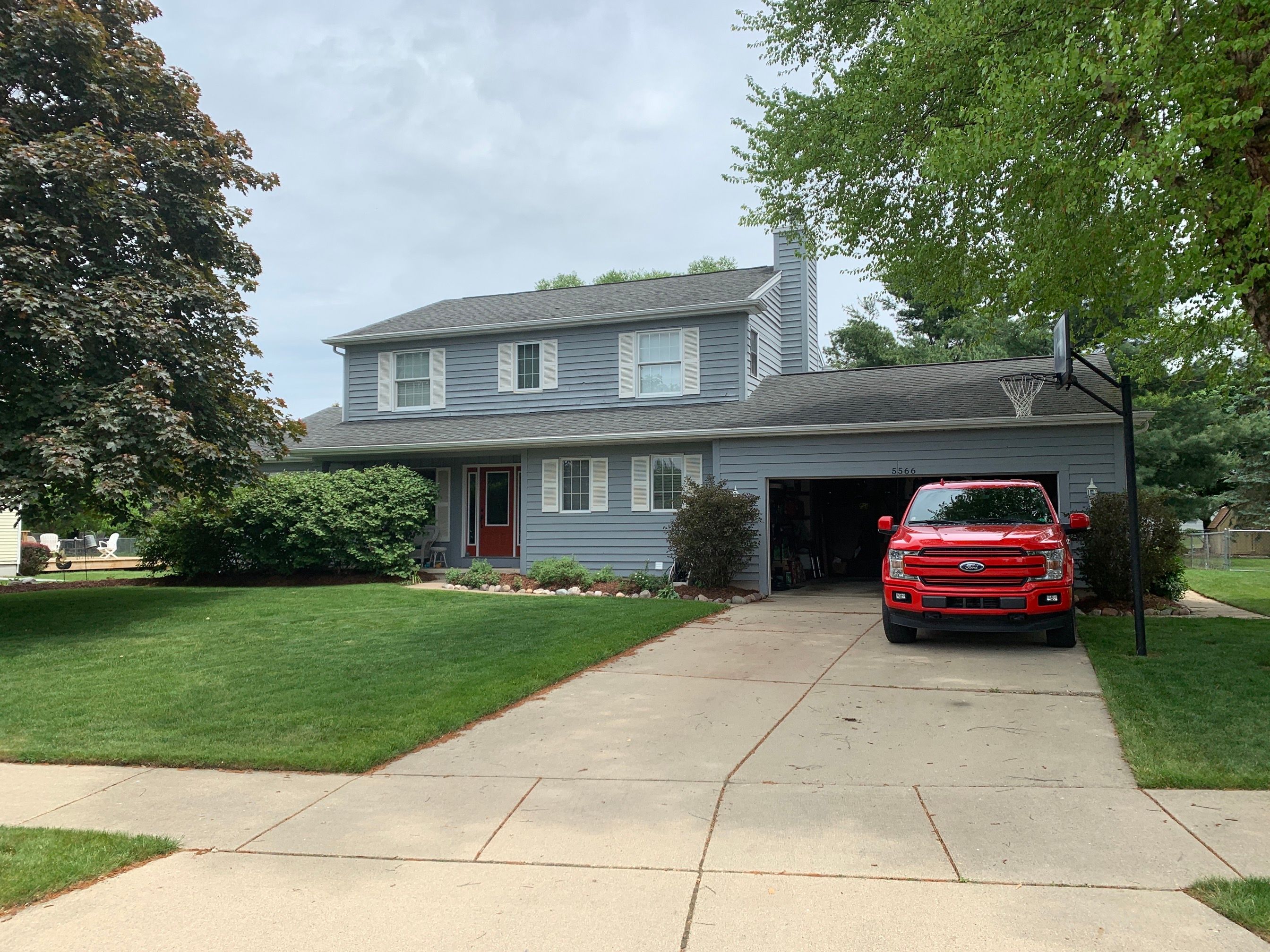 Complete Roof and Siding Installation in Haslett by Acme Exteriors