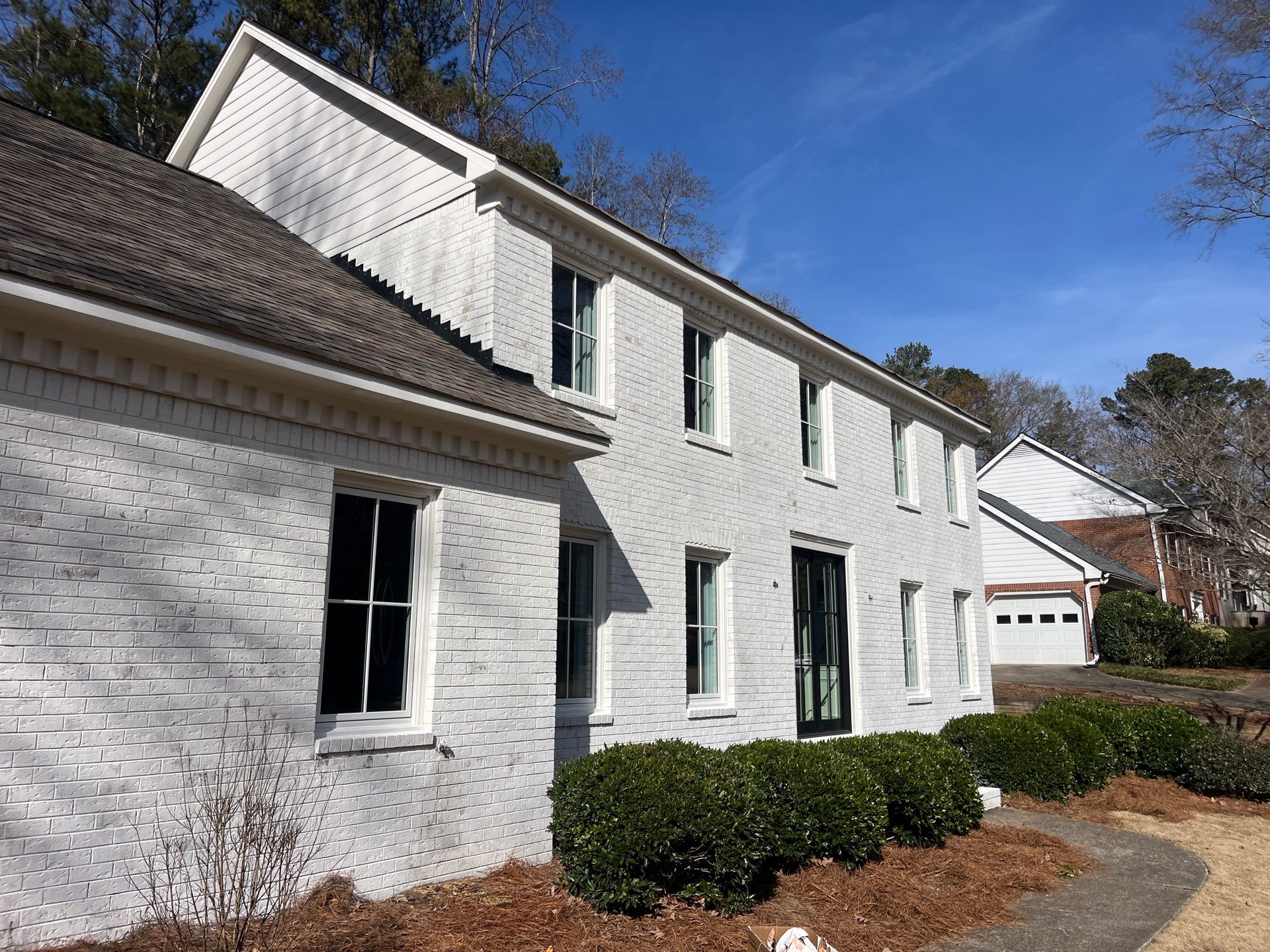 Romabio Brick Lime Wash and Cedar Tongue & Groove Porch Ceiling Installation in Marietta, GA by Nelson Exteriors 