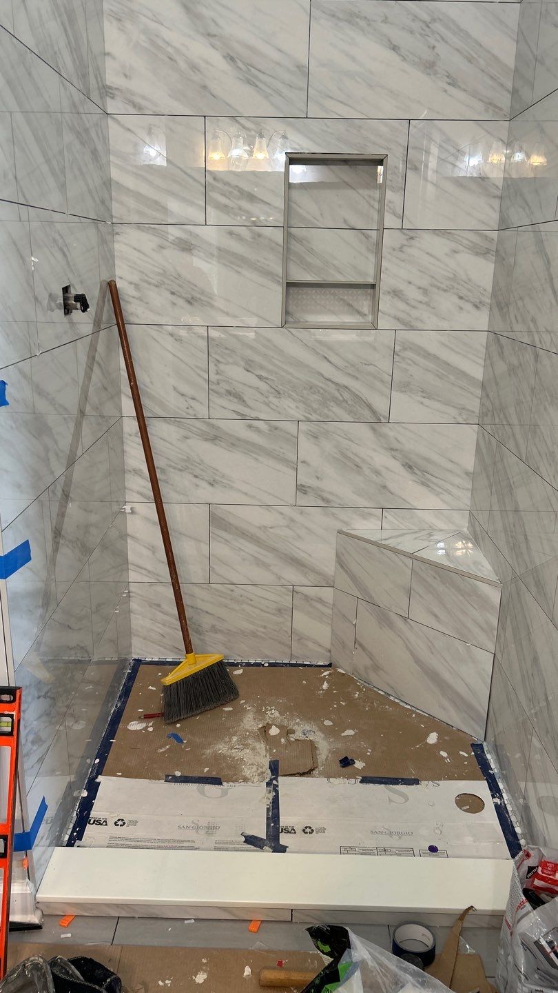 Tile shower remodel and heated floors by Footprints Floors of Nashville