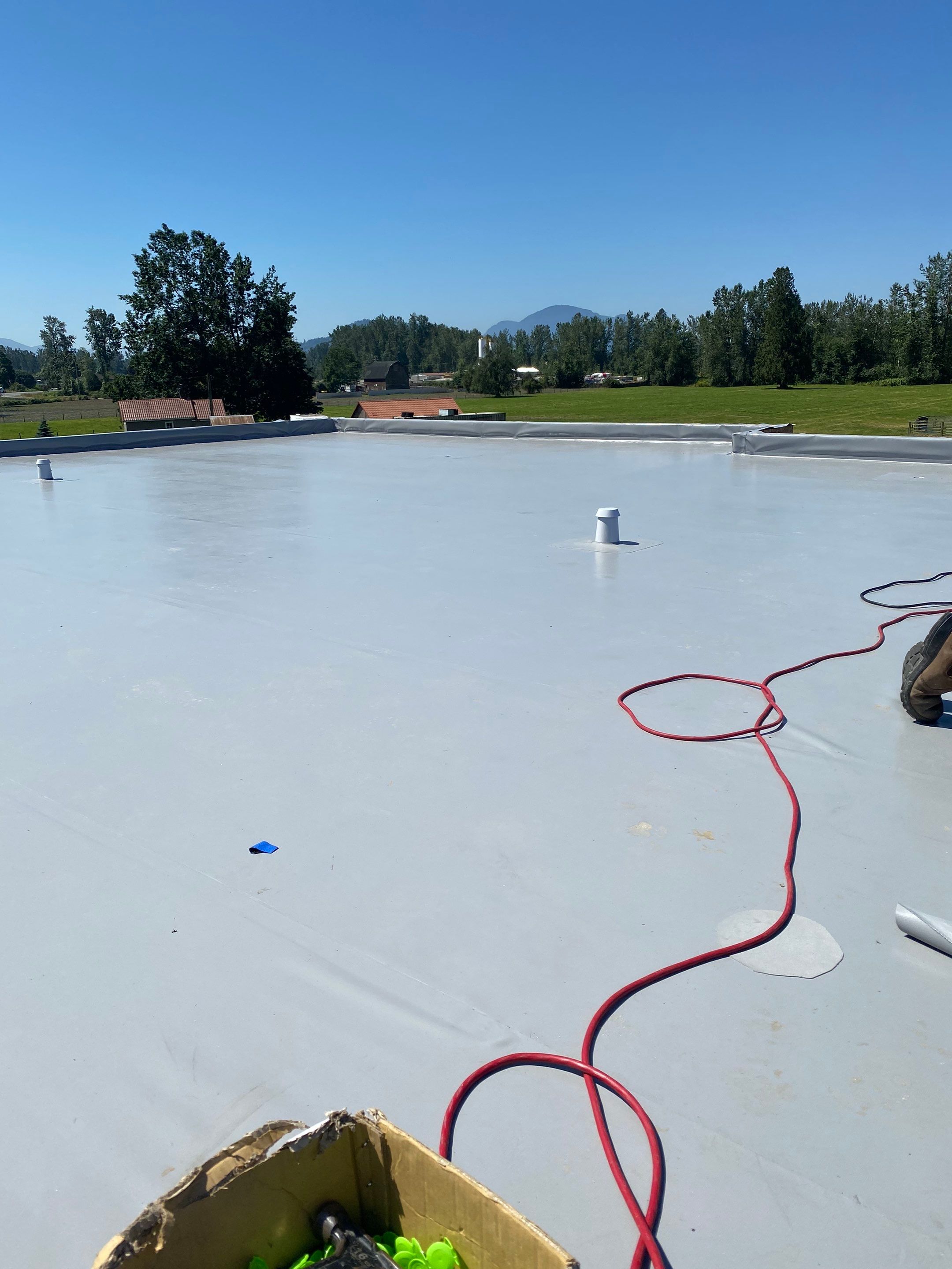 Residential Roofing Installation using multiple products by Top Notch Roofing Inc