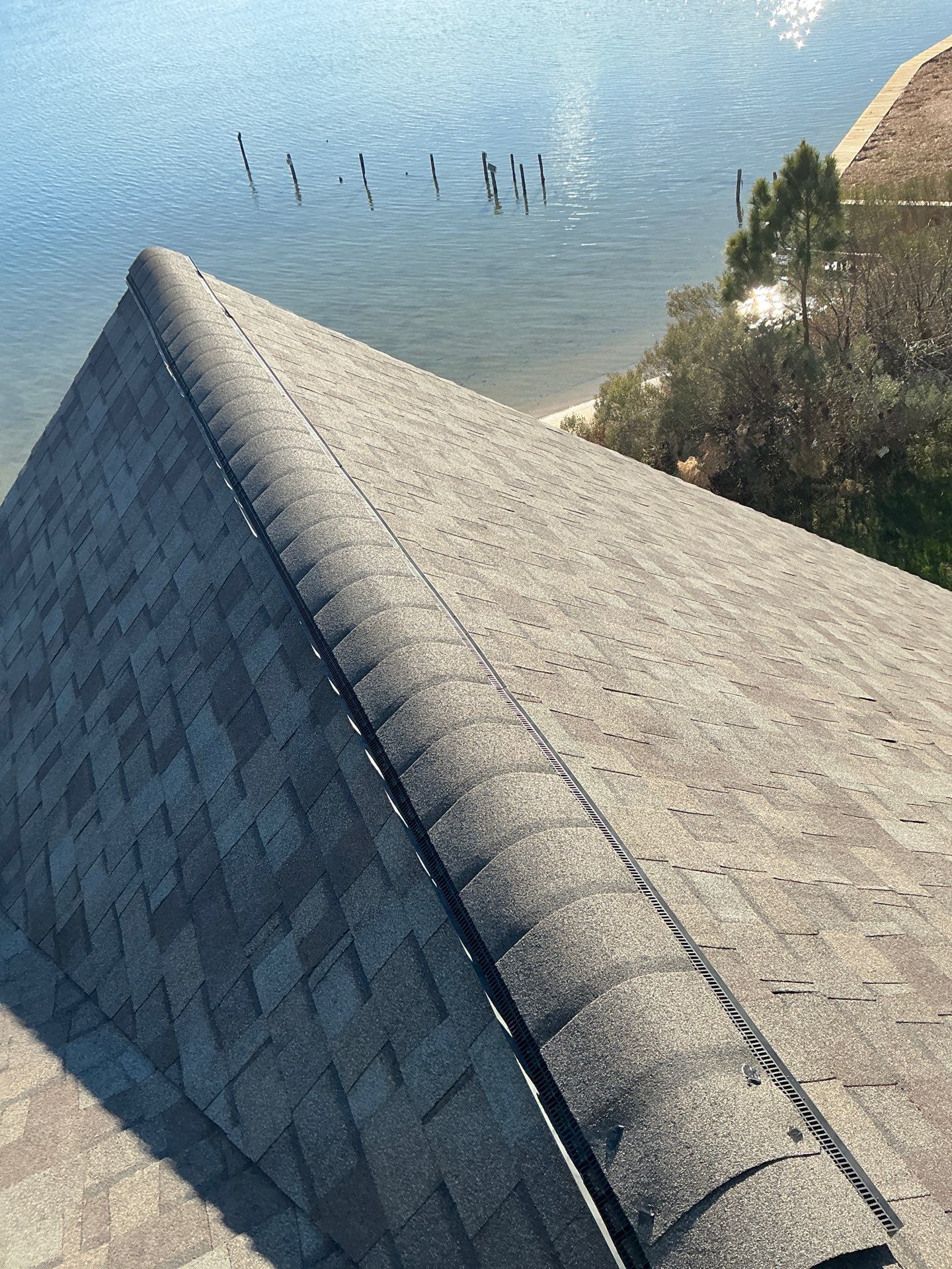 Waterfront Roof Replacement in White Stone, VA by Cade Construction