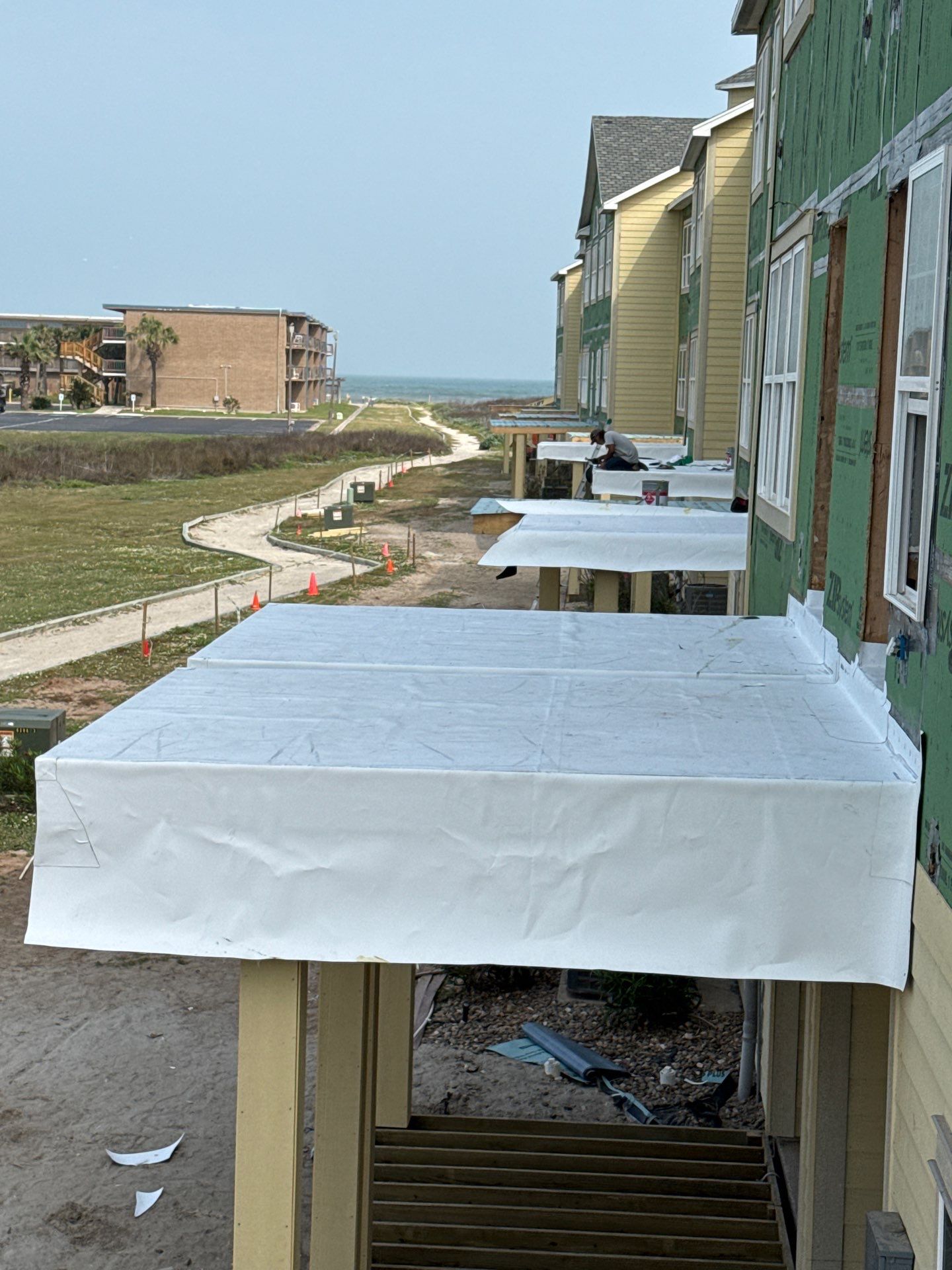 Walk Out Patio Cover by Bayfront Roofing and Construction