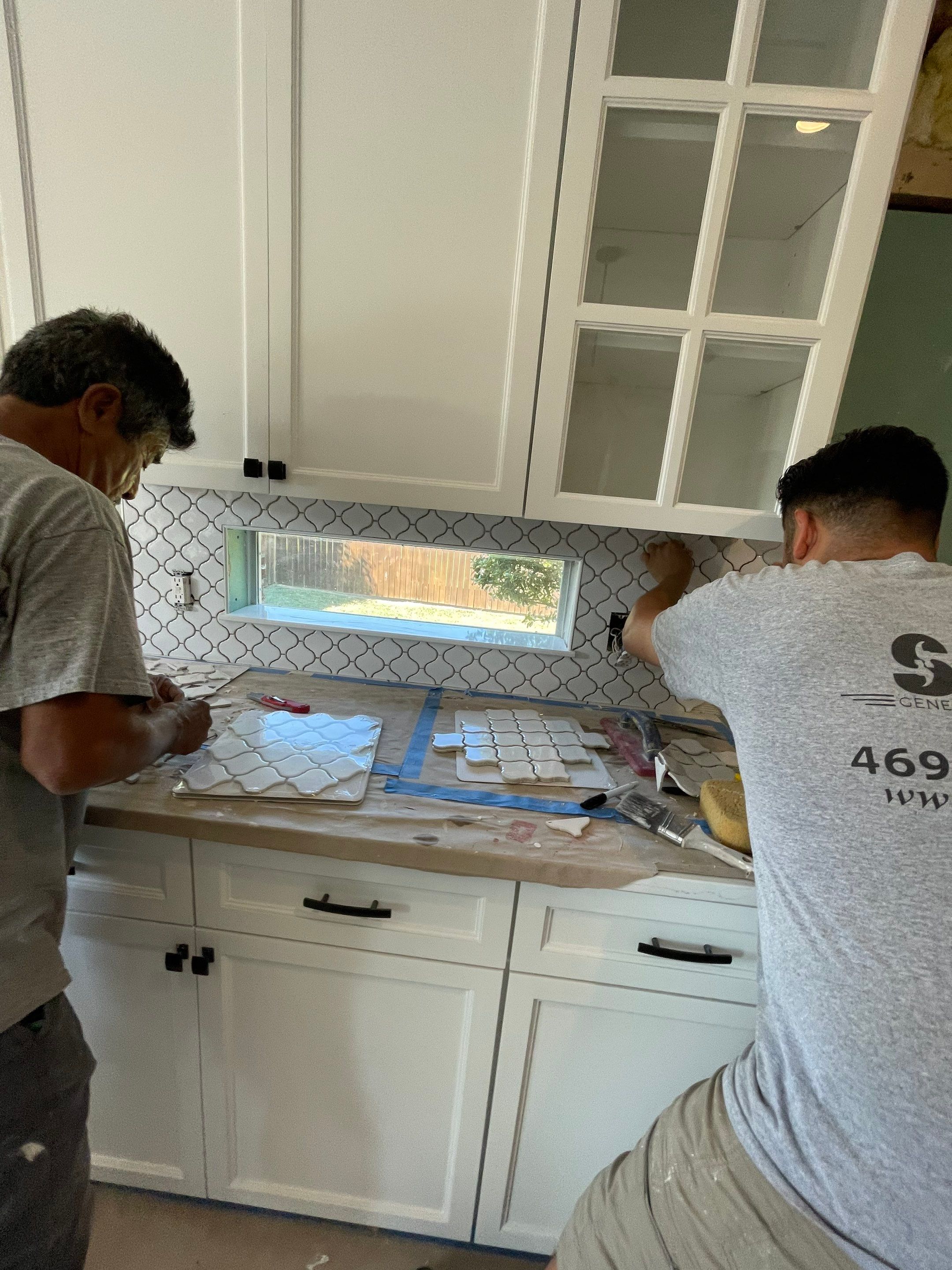 Custom cabinetry Kitchen Remodel by SLM General Contractors & Roofing