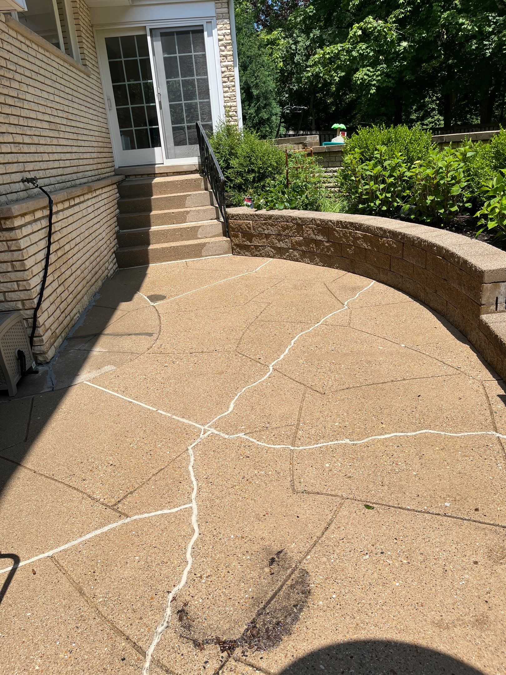 concrete power washing using Algaecide, soft wash soap by Northern Power Washing LLC.