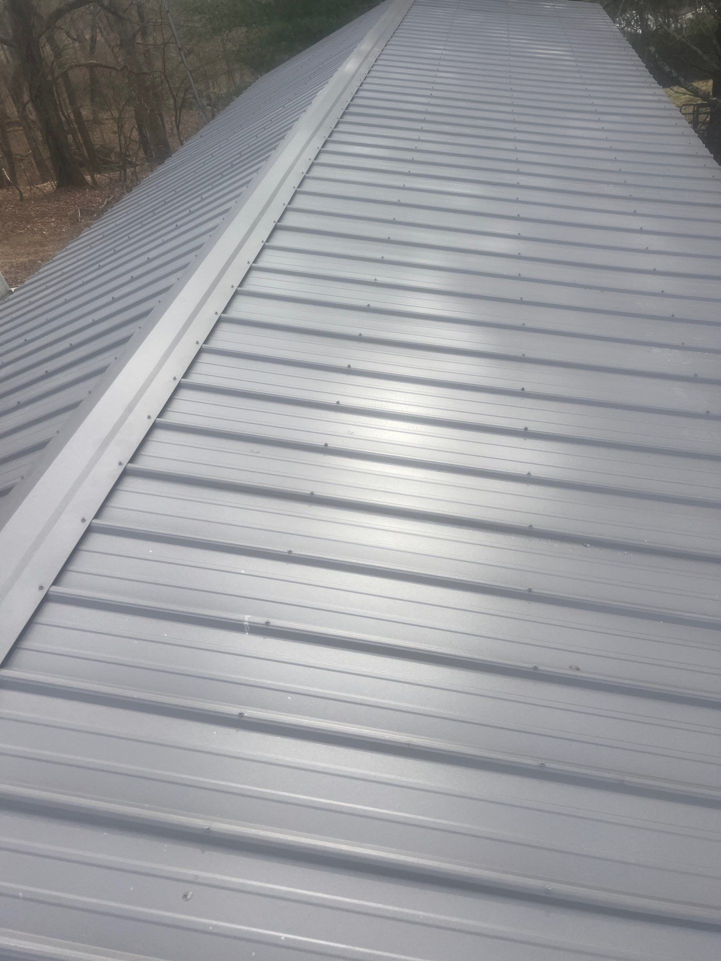 Textured Charcoal Gray using 29 Gauge AG Panel by Omnia Roofing