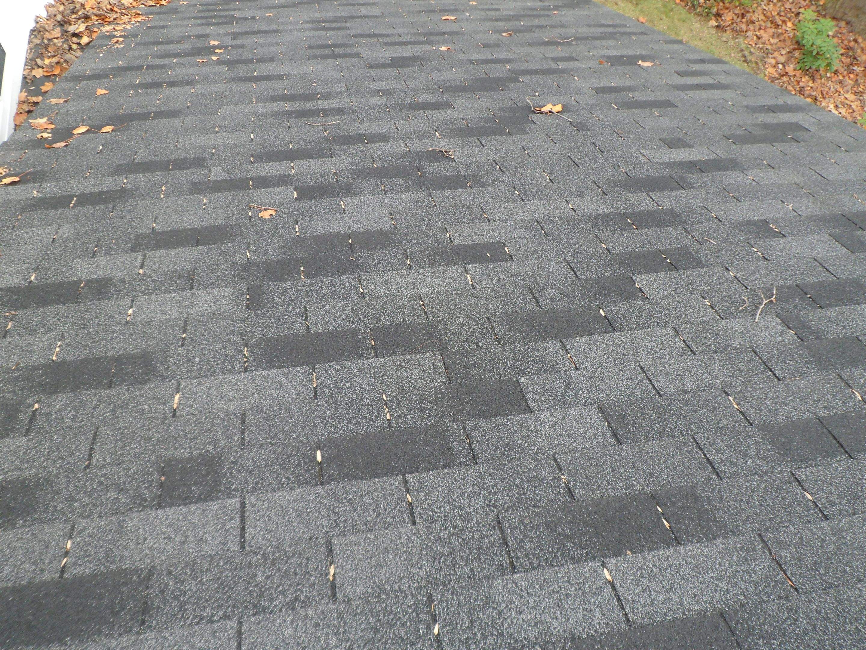 Residential Roofing Installation using Charcoal Black by Alpha Design Services