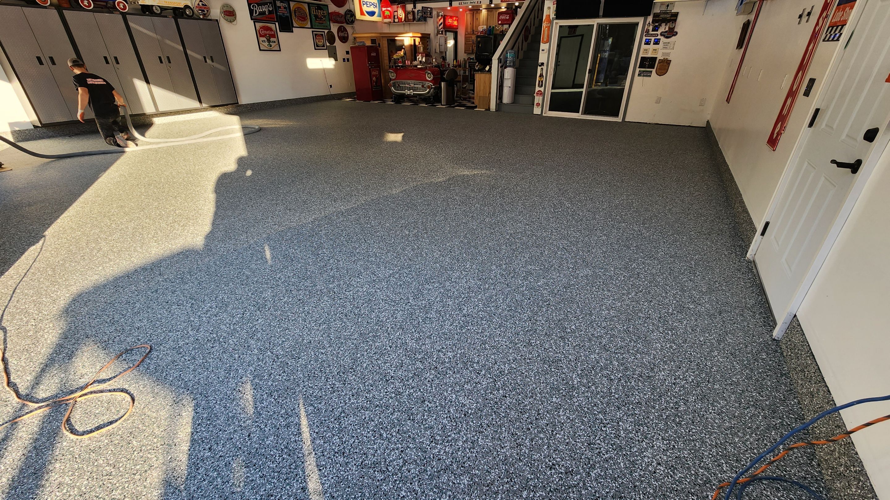 Garage Transformation using Domino with Blue by Croc Coatings, LLC