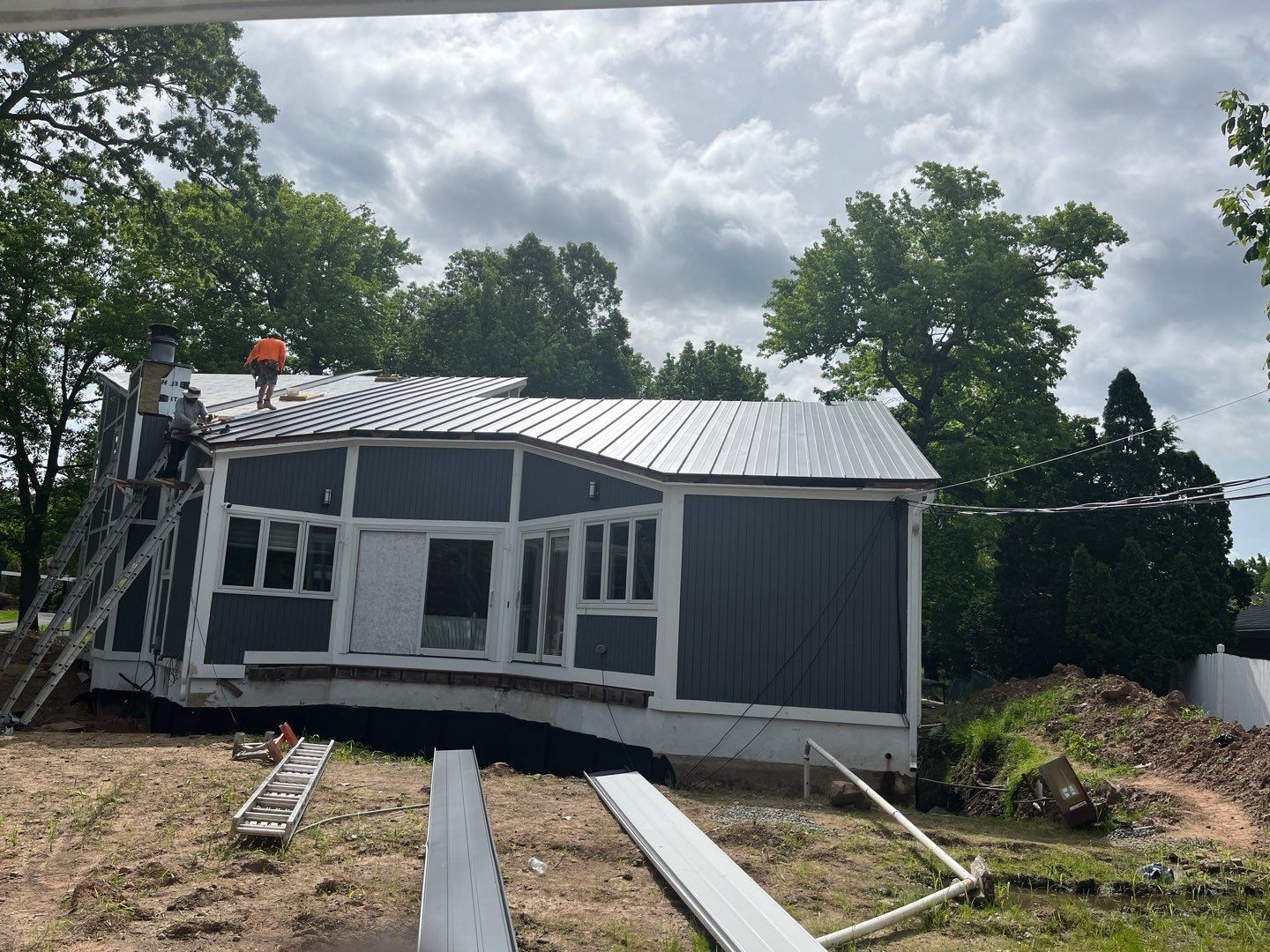 Residential Roofing Installation using Aluminum 032GA - Color Matte Black by CMNG LLC