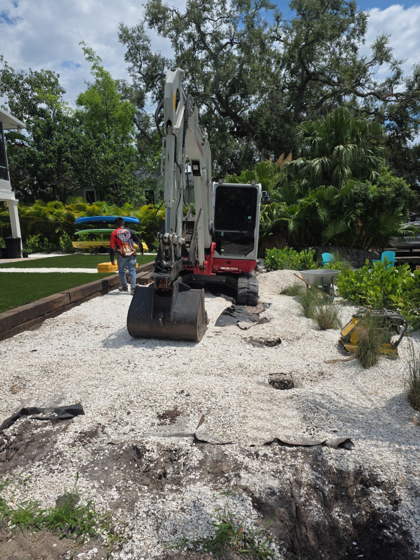 Grading back yard oasis by Level One Grading