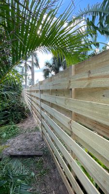 Wood Fence Installation using Shadowbox Wood Fence