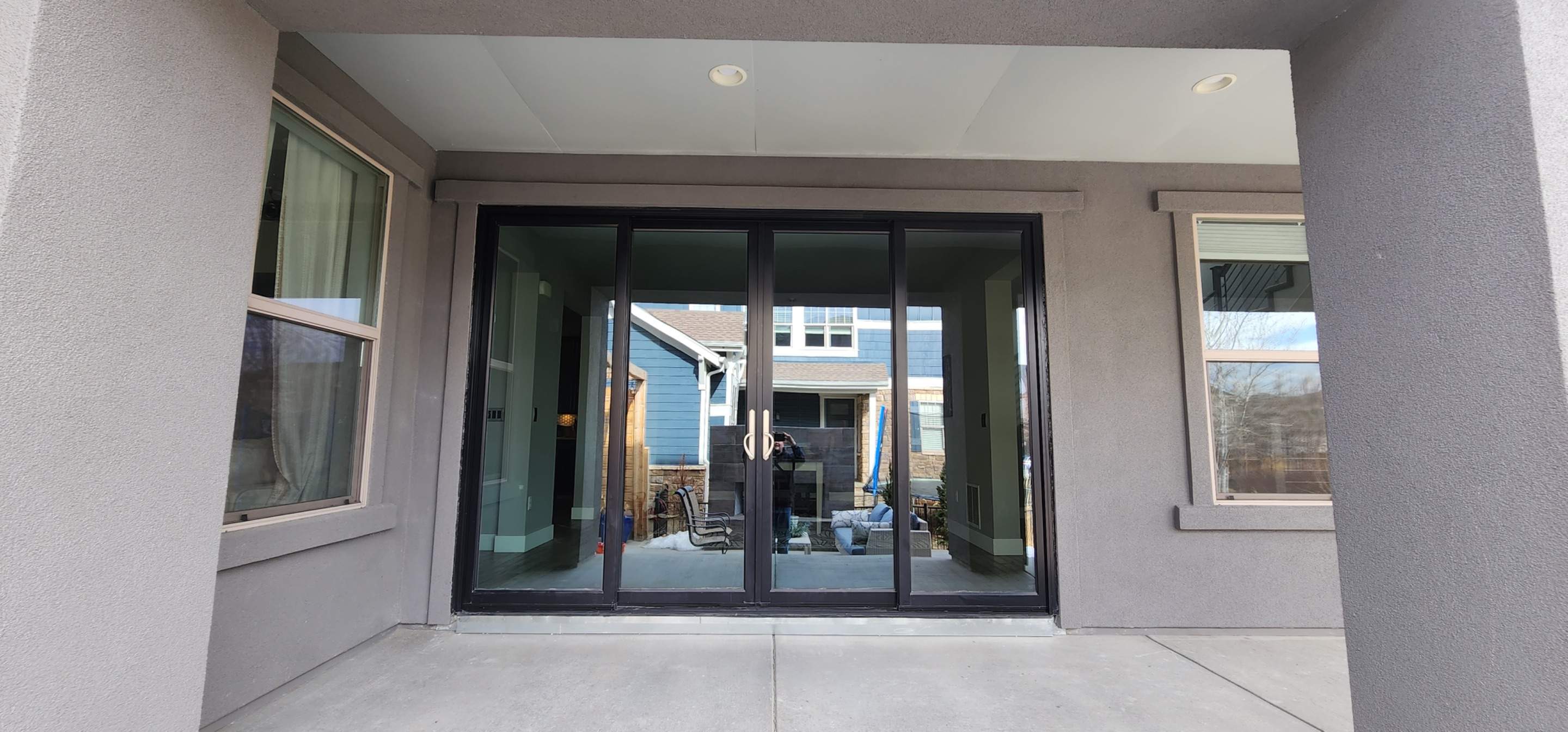 Open your space up to the outside! 4 Panel Patio door replacing 2 windows by 1st choice windows and siding