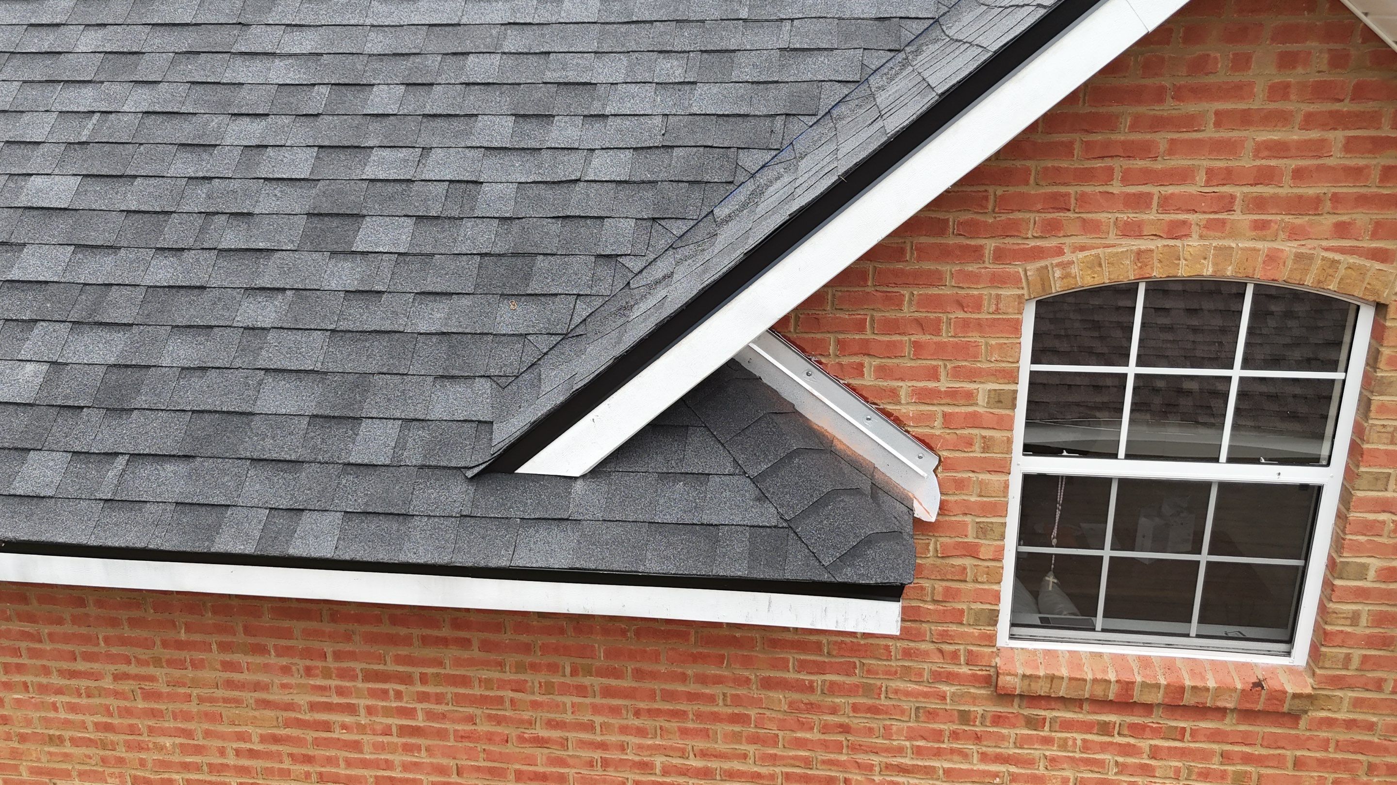 Comprehensive Onyx Black Asphalt Shingle Roof Replacement for Flagler Beach Residence by Trinity Restoration and Roofing LLC