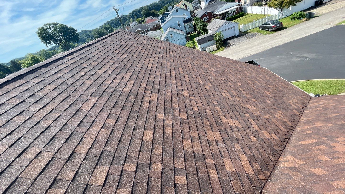 Commercial Roofing Installation using Performance Shingles by Mr. Roofer