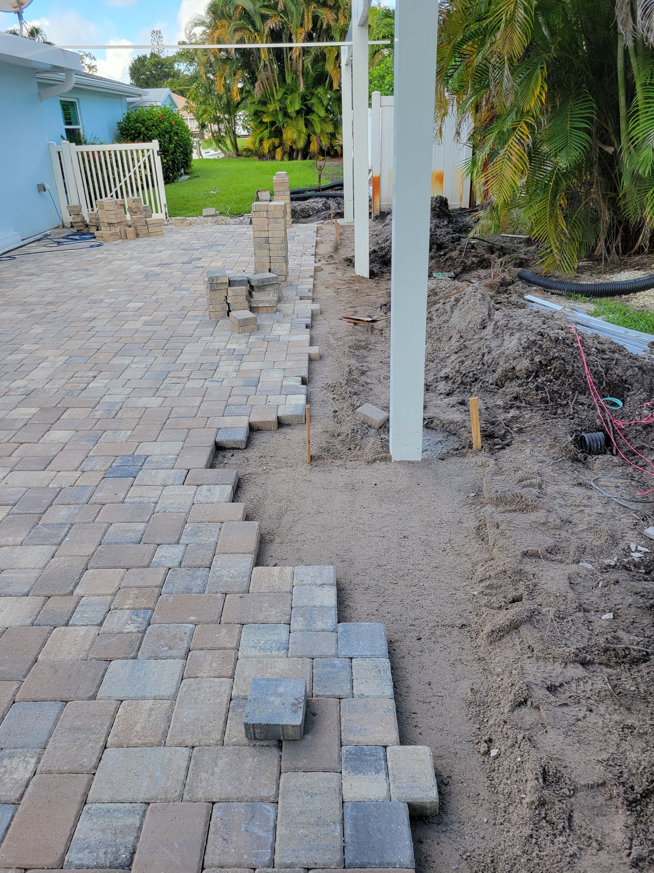 Stuart Showcase: Turning Concrete Chaos into Paver Perfection by Alpha Zeta Enterprises Inc