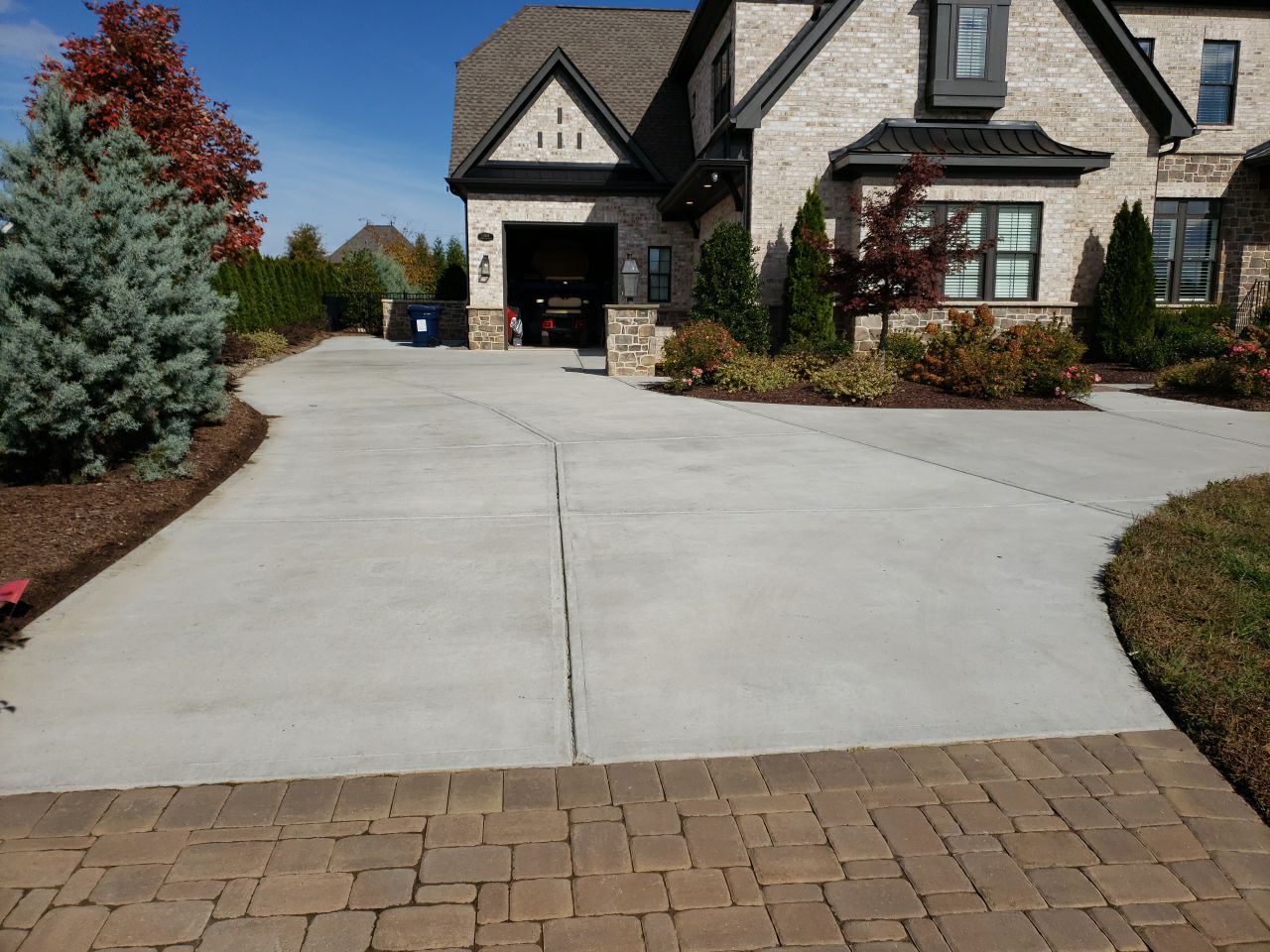 Driveway Clean using cleaner by Power Wash Masters LLC