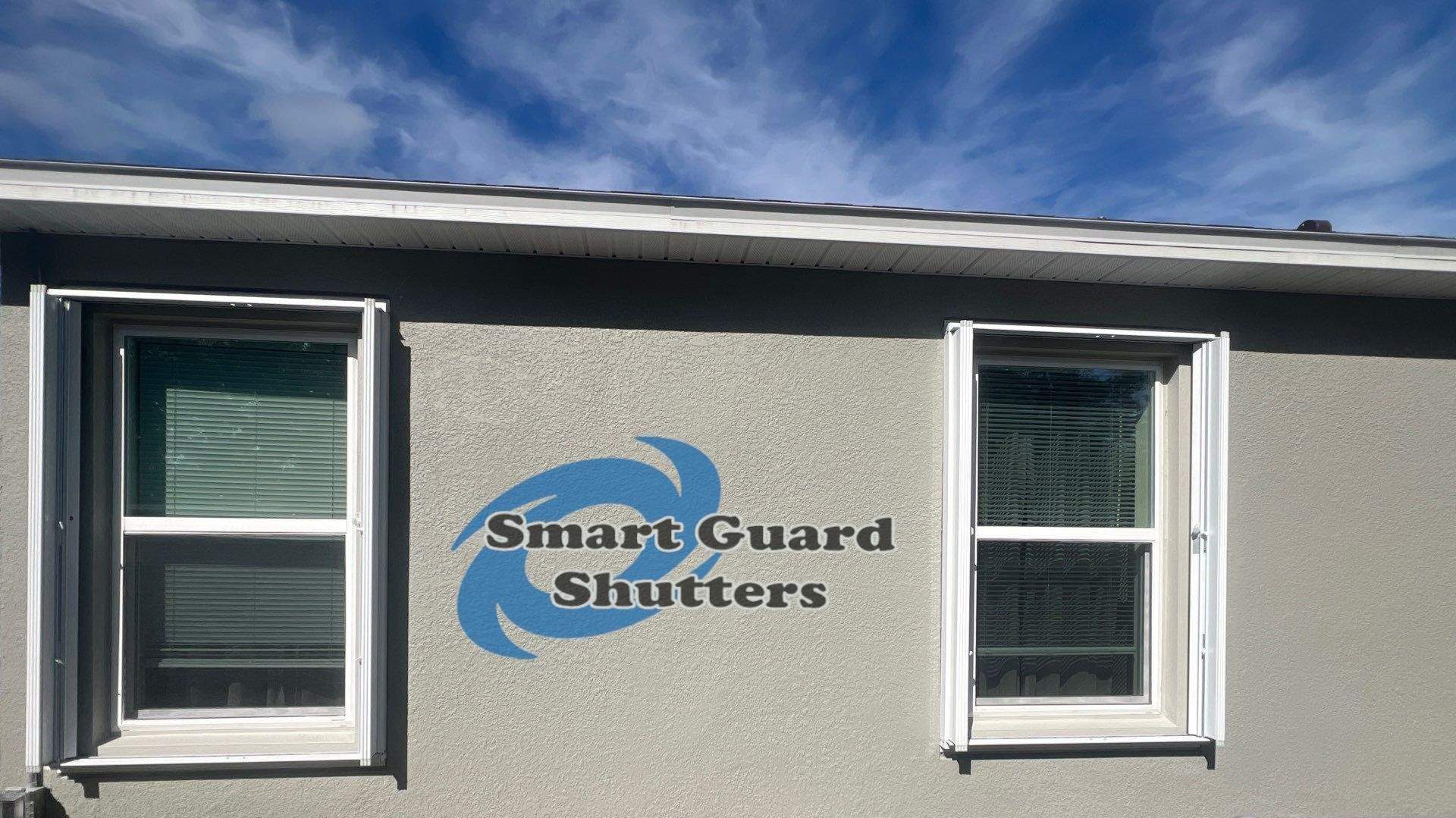Accordion Shutters in White by Smart Guard Shutters
