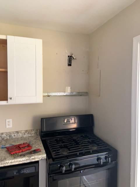 Microwave & Cabinet Installation by A1 NERDY HOMES LLC