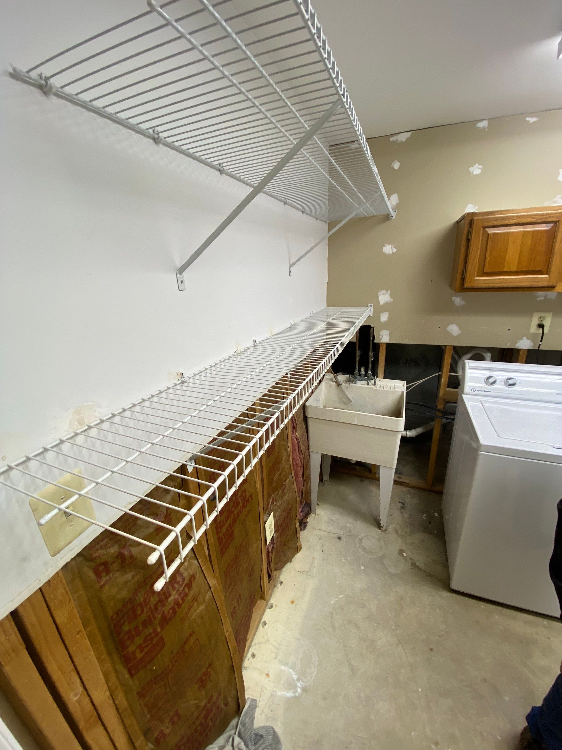 Laundry Room Redmodel using Lifeproof Luxury Vinyl Plank Flooring by The Smet Companies, LLC