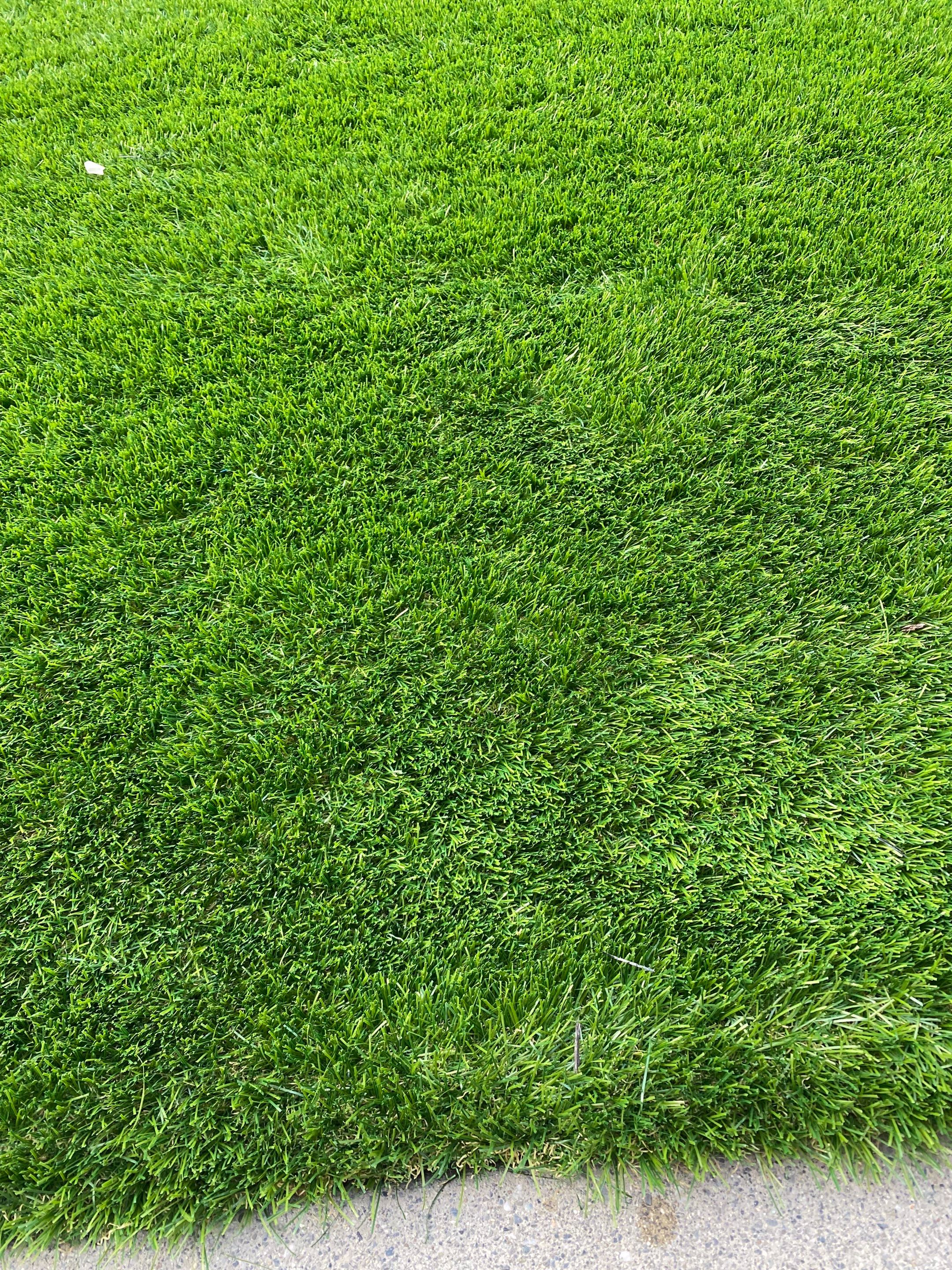 Patio Installation using Concrete, Retaining walls, and Turf install by Jireh Asphalt & Concrete Inc 