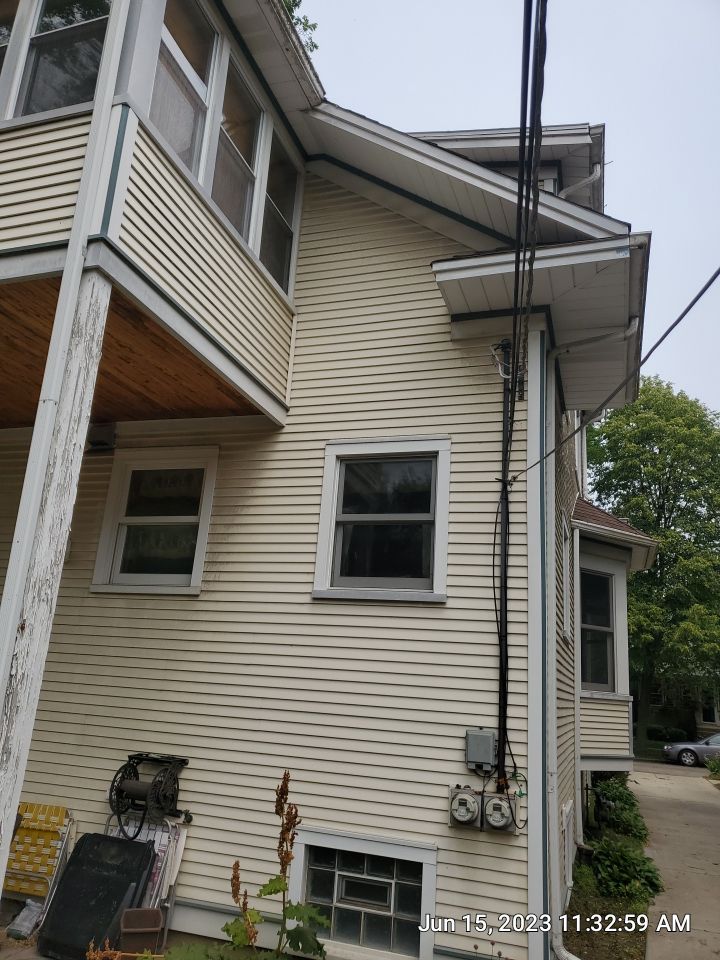 Housewashing  using Algaecide, soft wash soap by Northern Power Washing LLC.