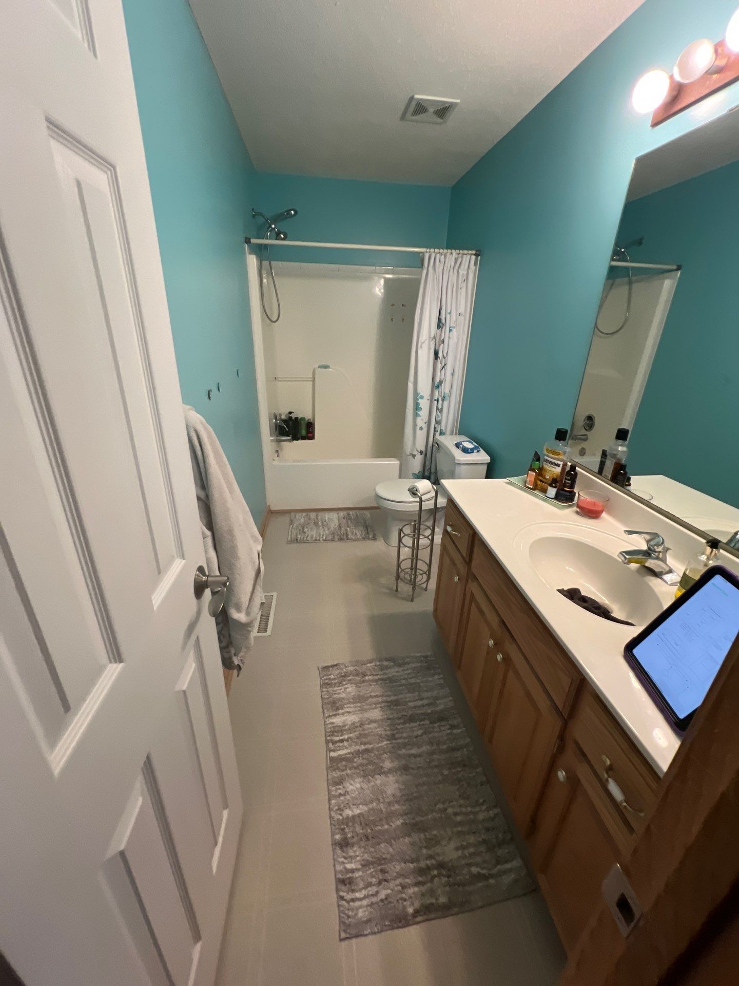 Bathroom Remodel using Luxury Vinyl Plank by The Shower Company