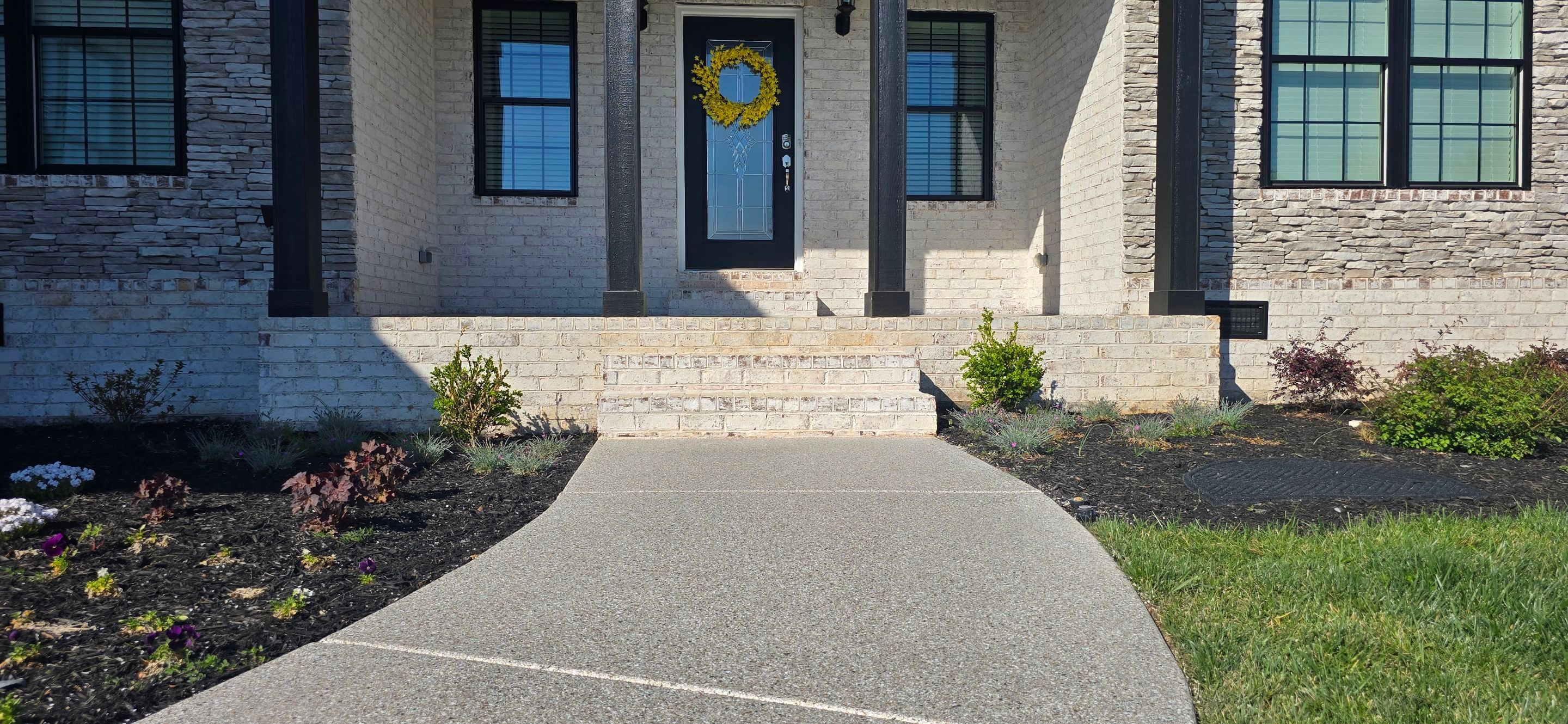 Driveway, Sidewalk, & Porch Using Claystone by Elite Floor Solutions