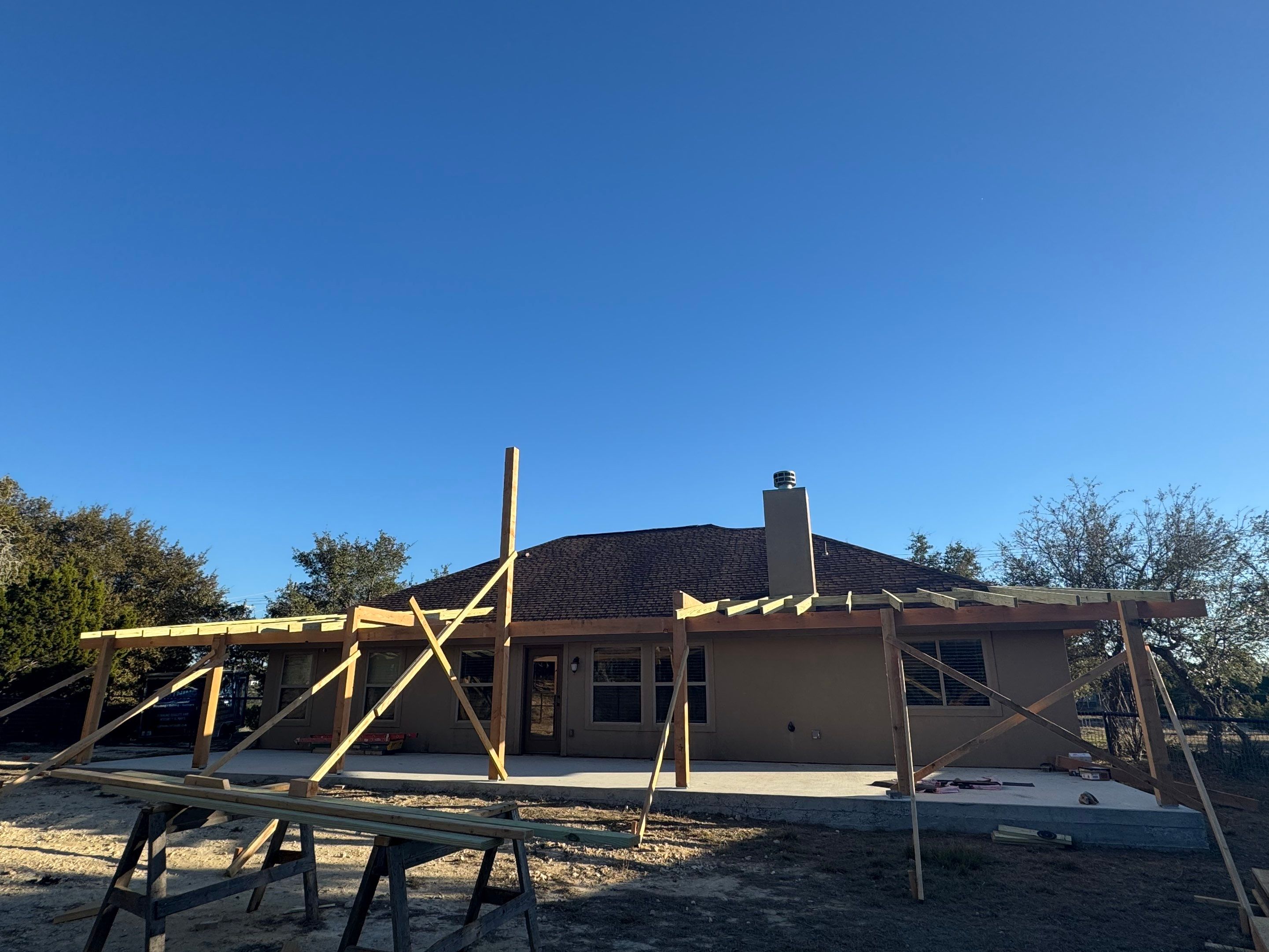 Reroof with Back Patio Addition using Owens Corning Duration Aged Copper by Lightning Exteriors