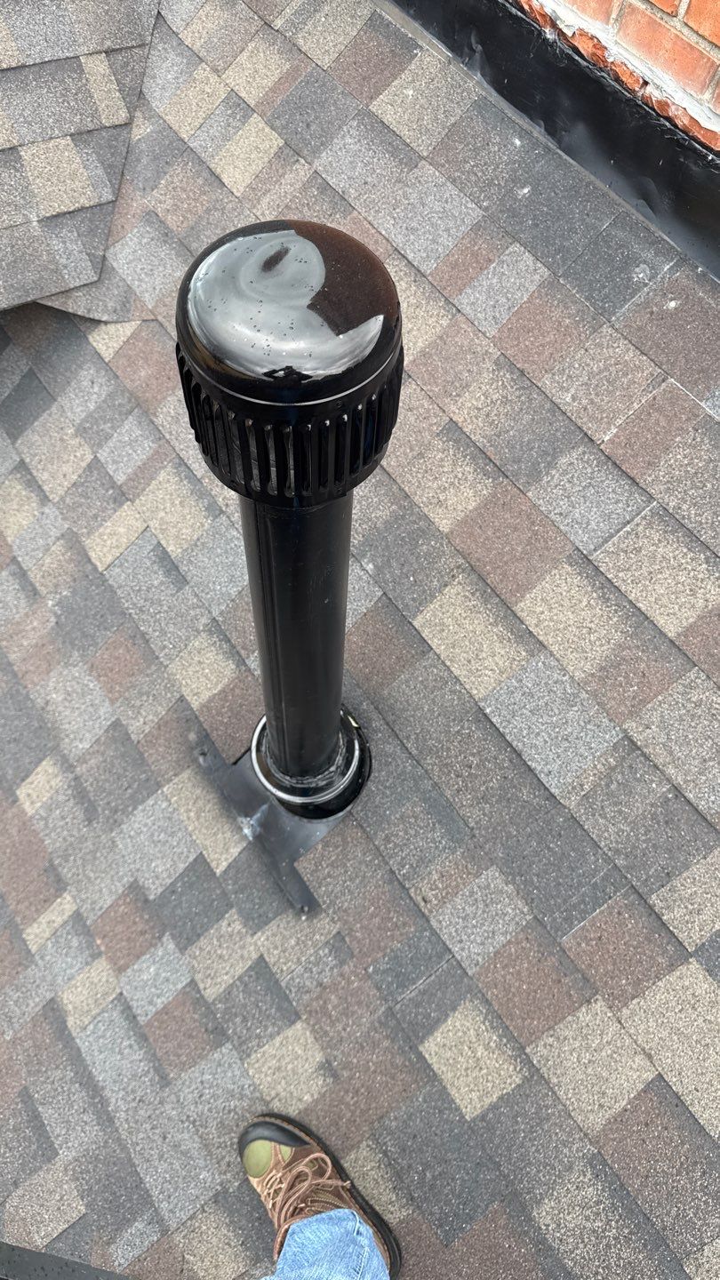 skylight and vent stack replacement in Edmond by McCann's Roofing and Construction