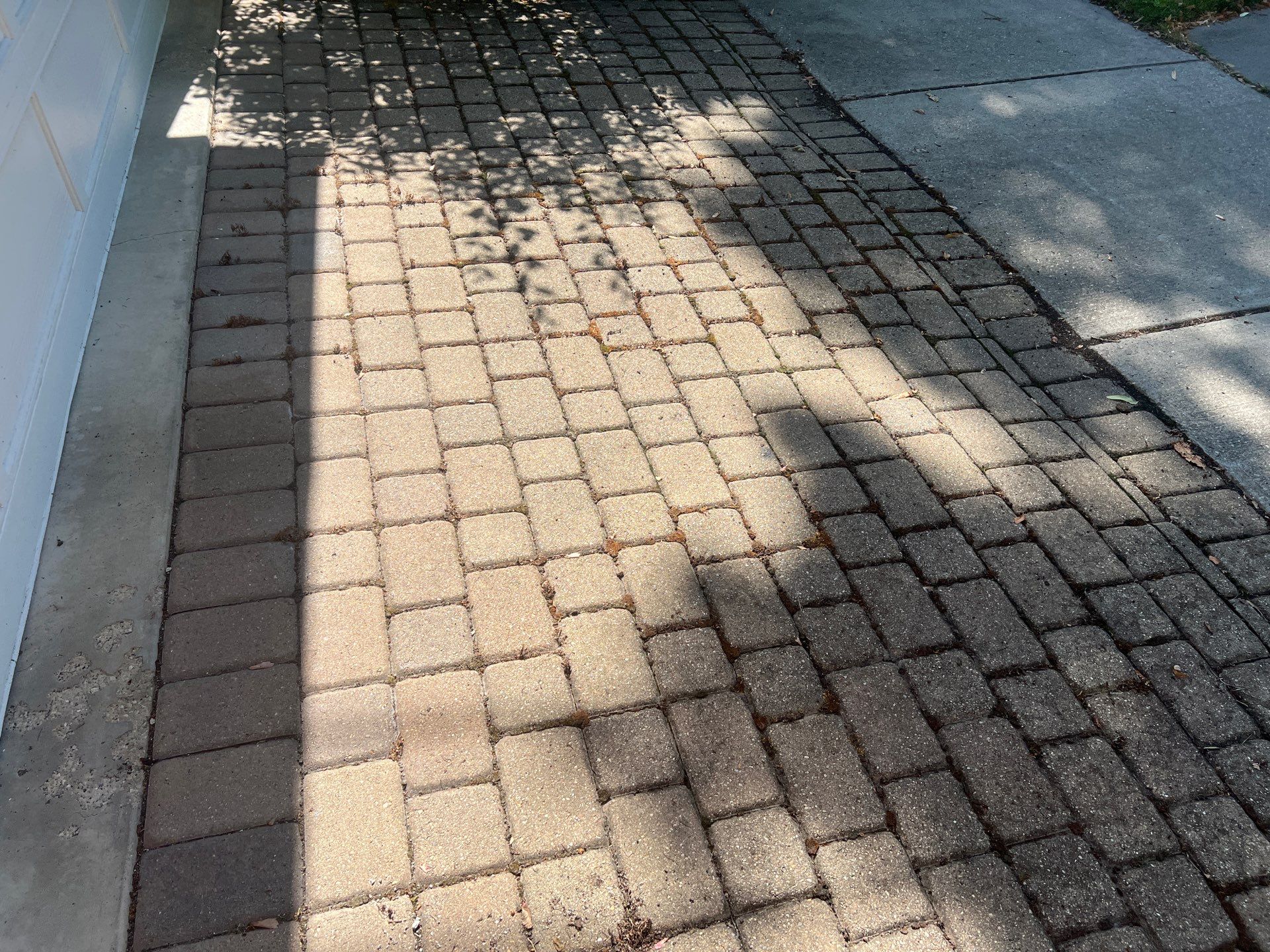Brick paver cleaning and sealing by Northern Power Washing LLC.