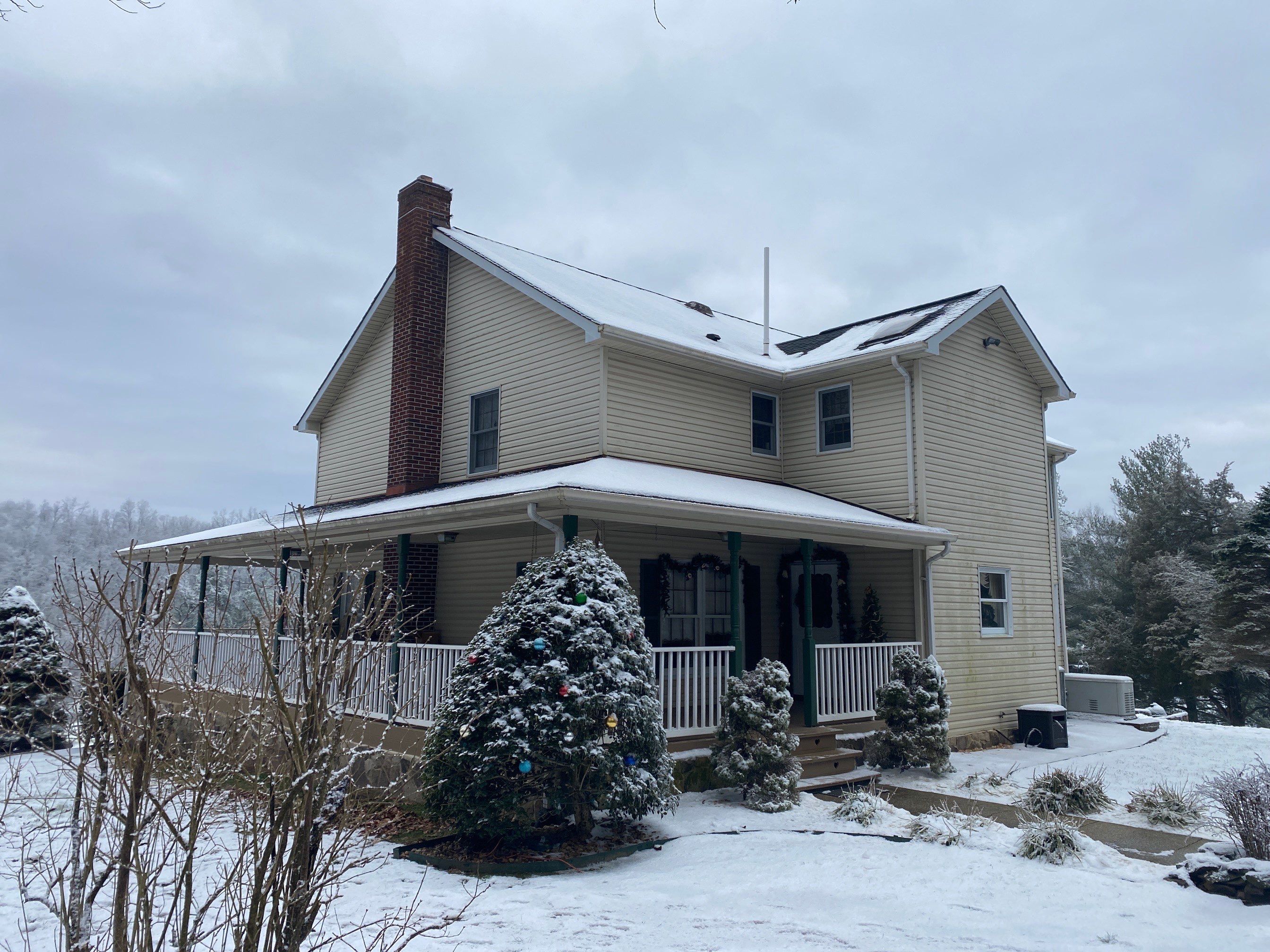 Exterior remodel including window replacement by American Home Contractors