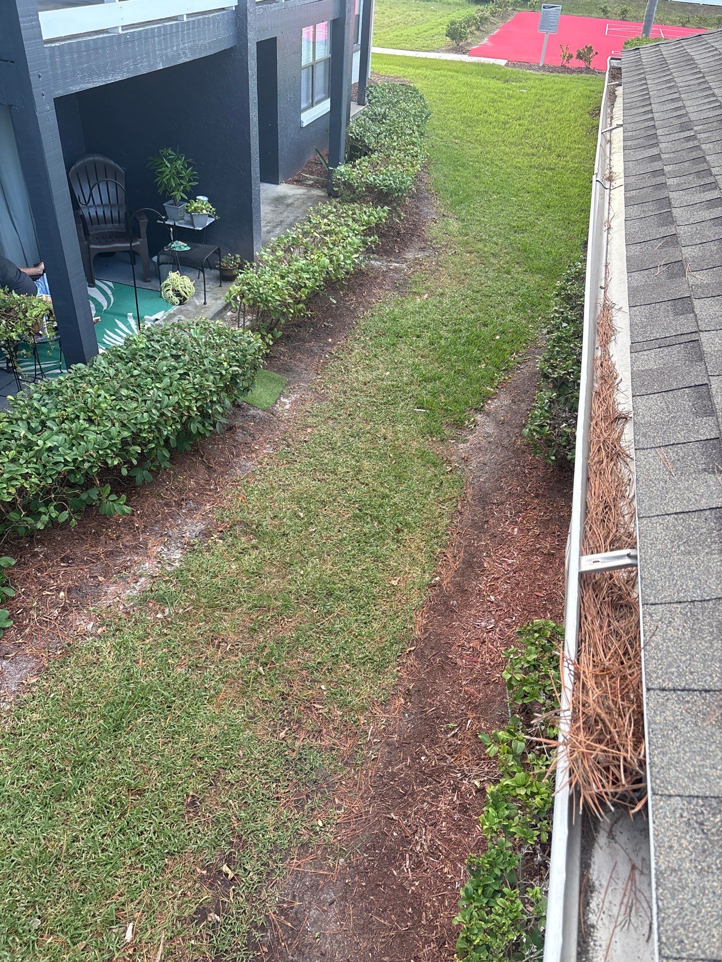 HOA gutter cleaning before photo.