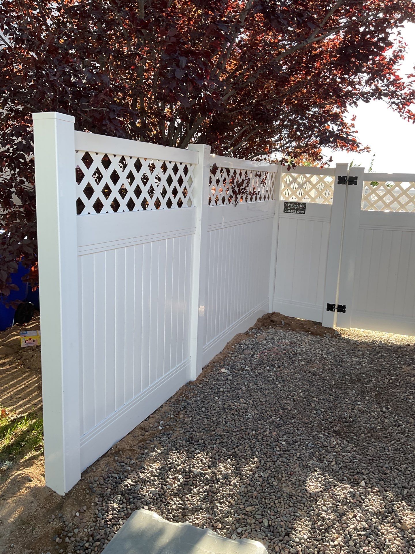 Lattice Vinyl with Privacy Vinyl Fence by Fence Guys Inc.