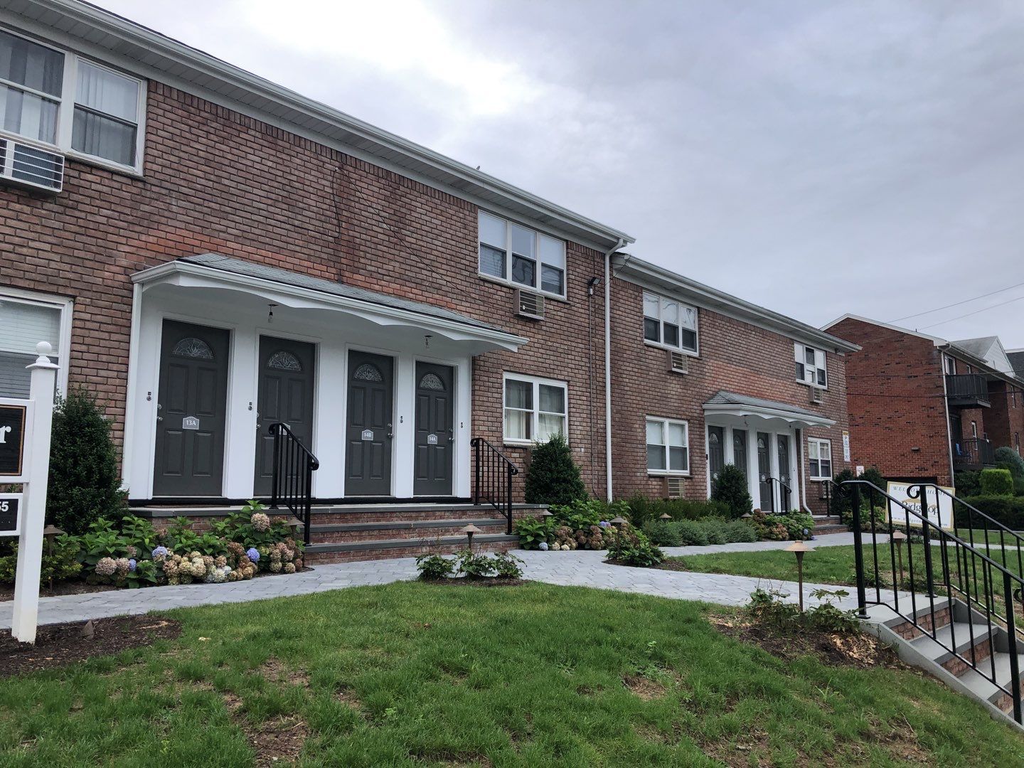 Multi-Unit Apartment Complex Exterior Brick Painting Project in Hackensack by Spectrum Painting, LLC