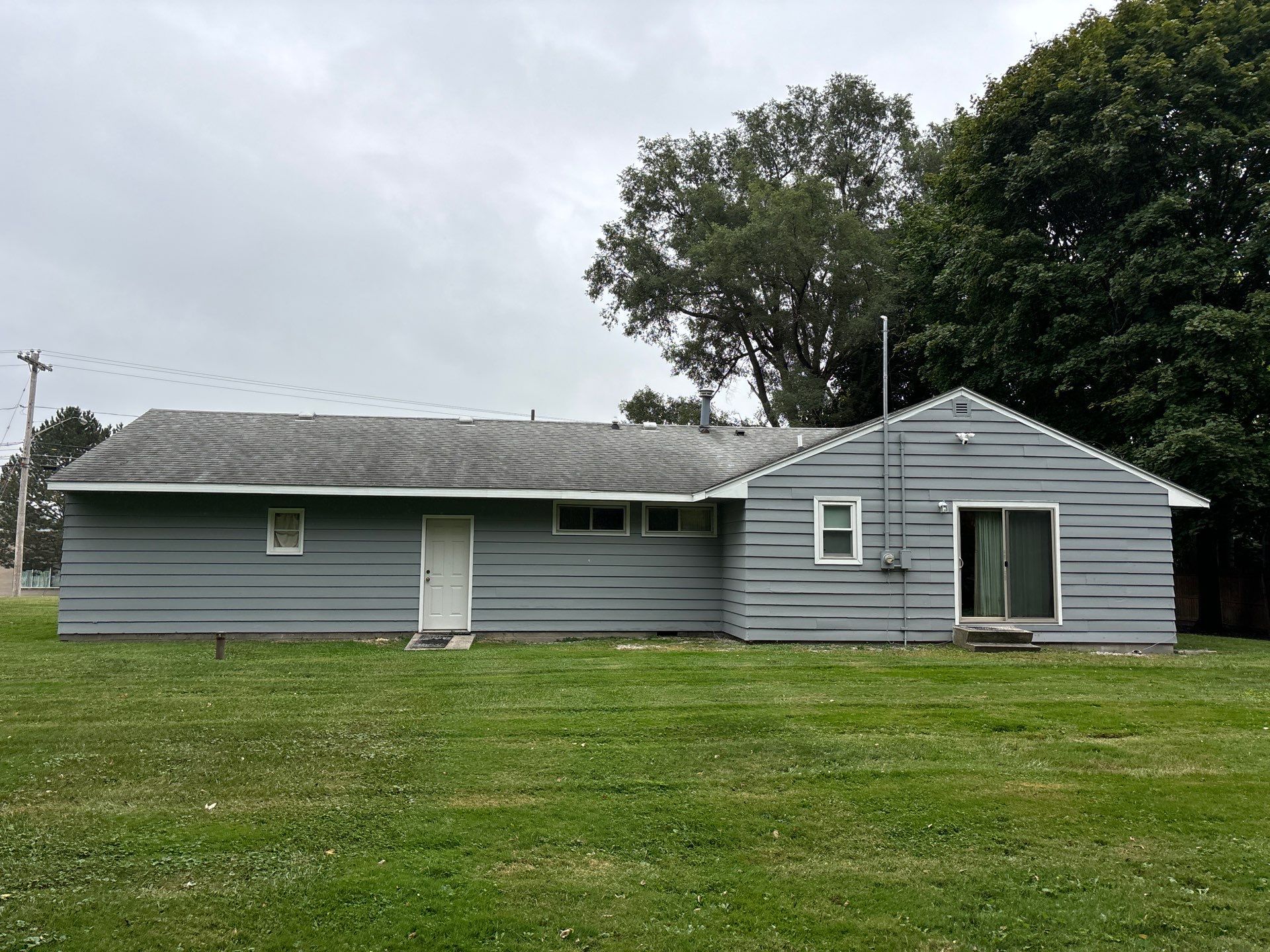 Gutter Installation using Seamless Gutters- Aluminum with Gutter Protection by Acme Exteriors