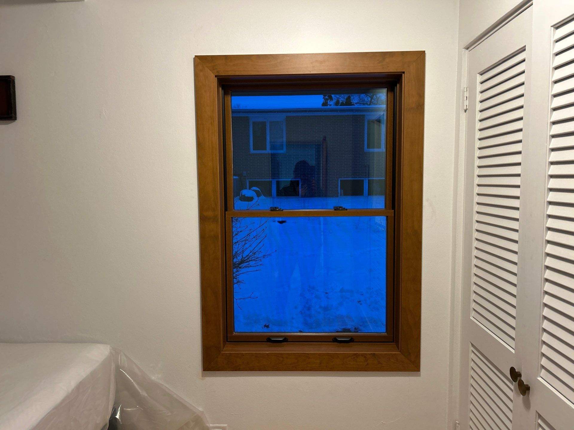 Black-Frame Pella Lifestyle Upgrade on a Partial Brick Home by United Windows and Siding LLC