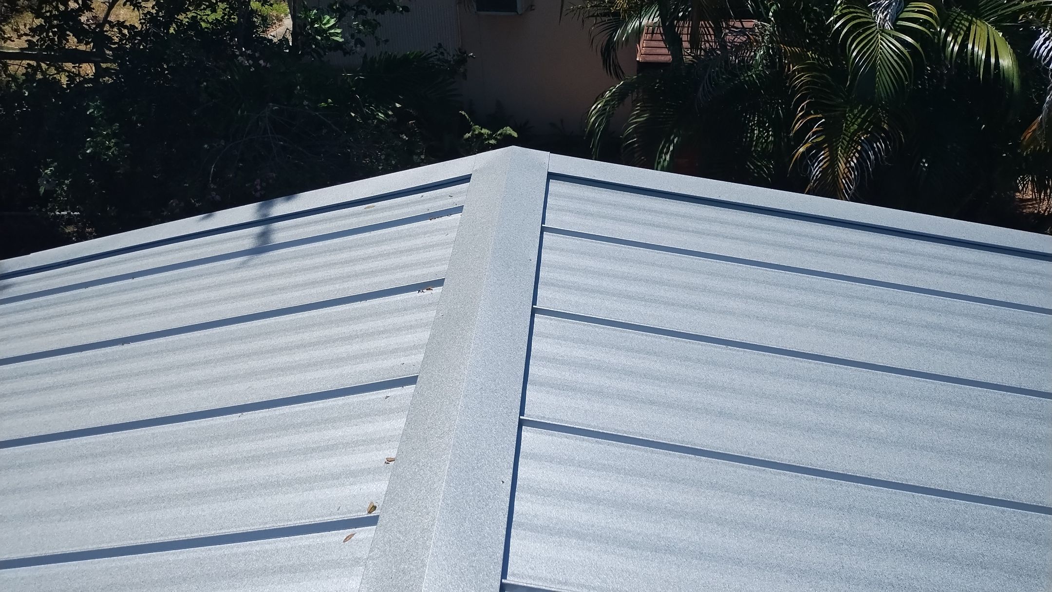 Residential Roofing Installation using 1" Nail strip metal roof by BLUES BROTHERS ROOFING