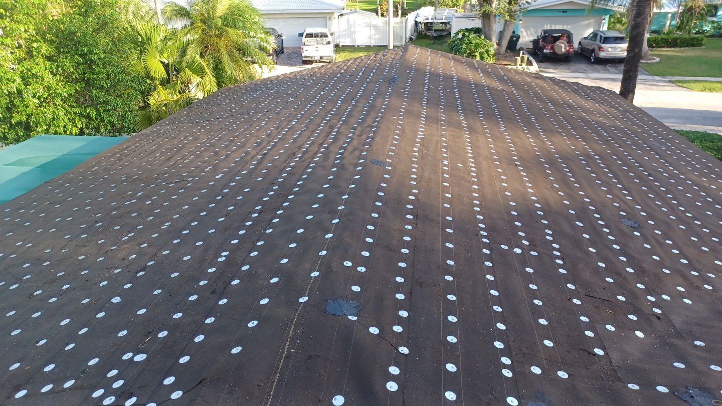 Residential Roofing Installation using 1" Nail strip metal roof by BLUES BROTHERS ROOFING