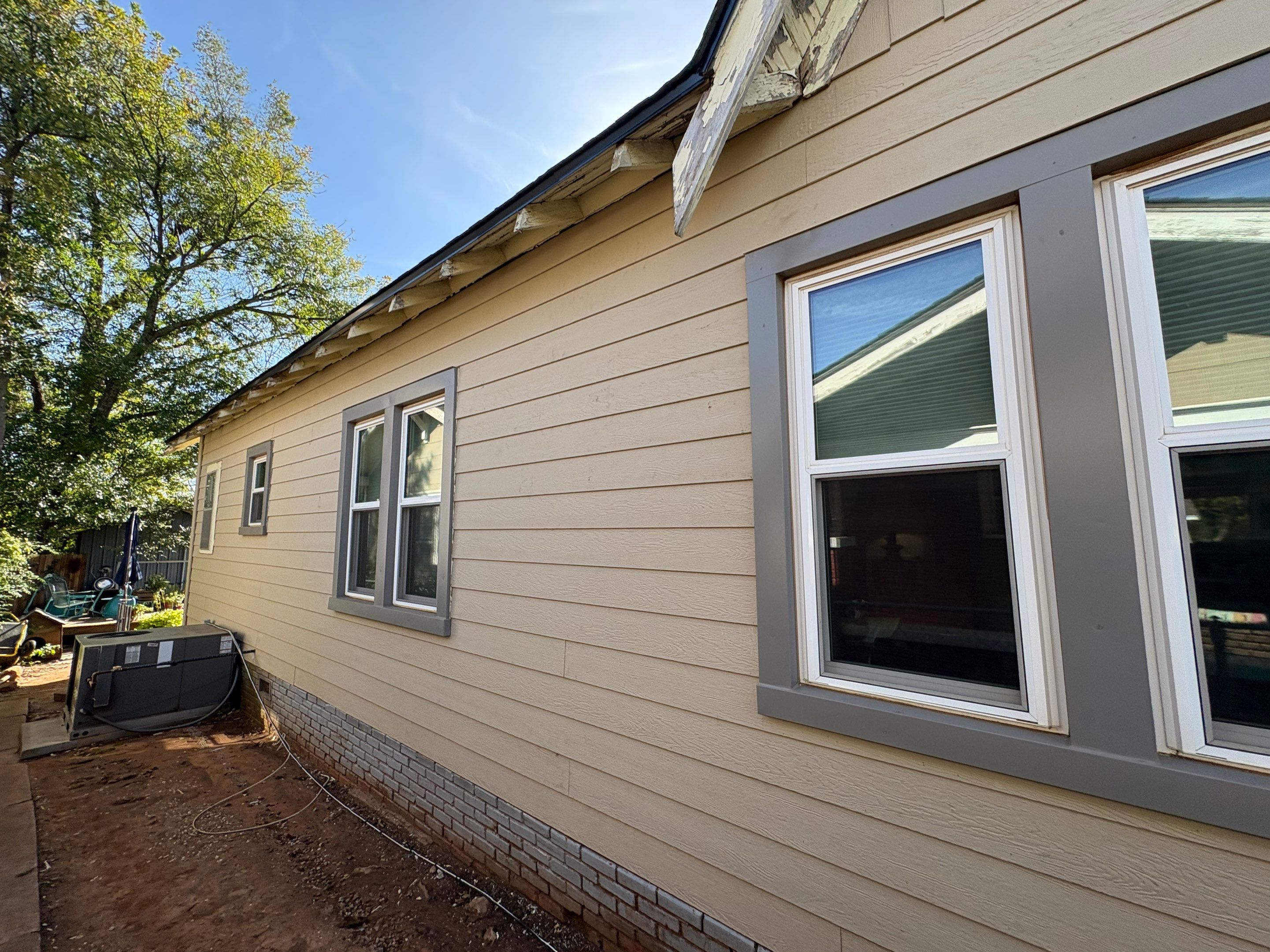 siding replacement in Guthrie by McCann's Roofing and Construction