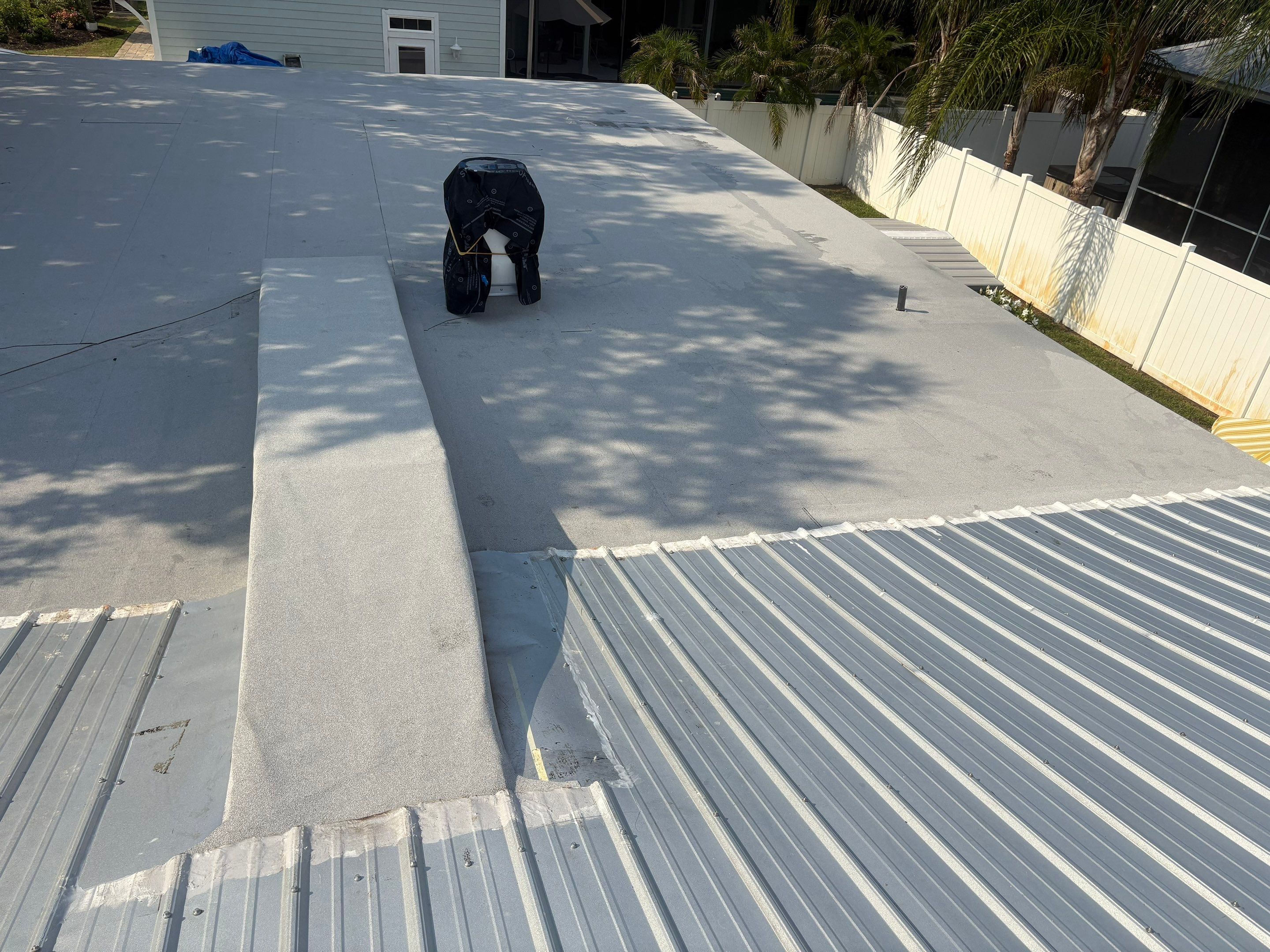 Flat Reroof Replacement New Smyrna Beach FL by Pinnacle Roofing Group