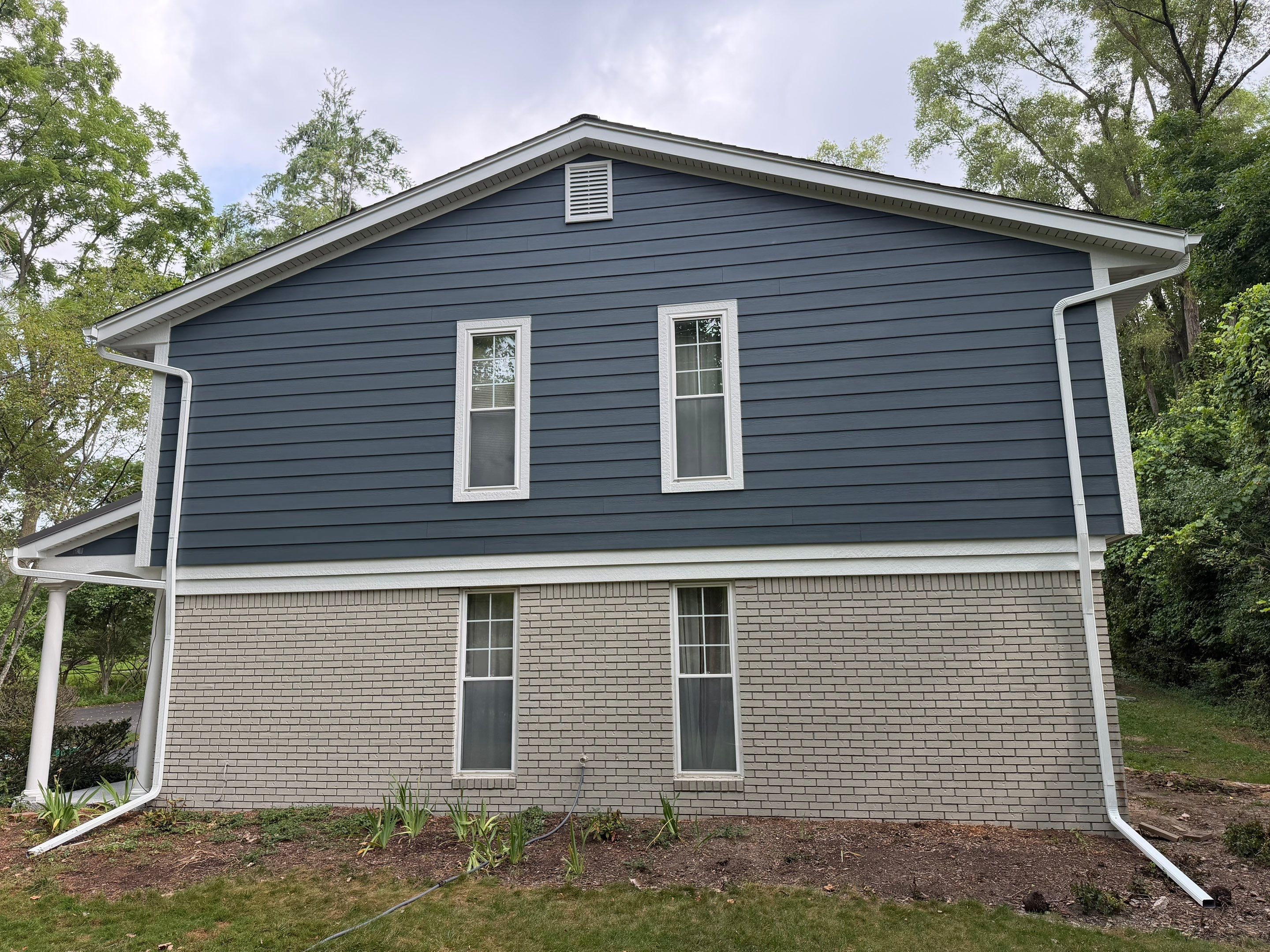 James Hardie Siding Replacement & Metal Roof by Bloomfield Construction & Restoration
