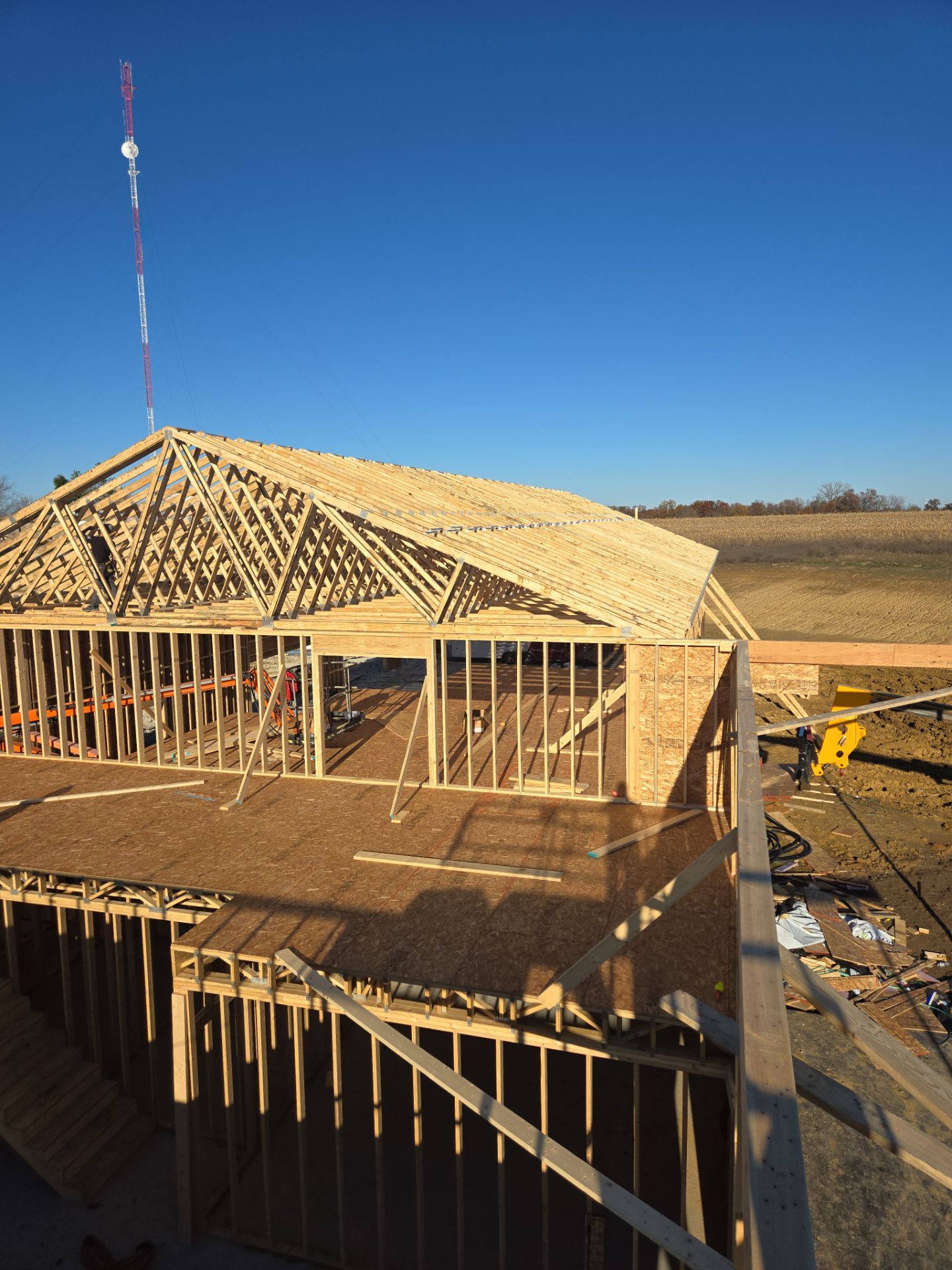 New Home construction w/ board and batten sides and metal roof  by Miles Construction 