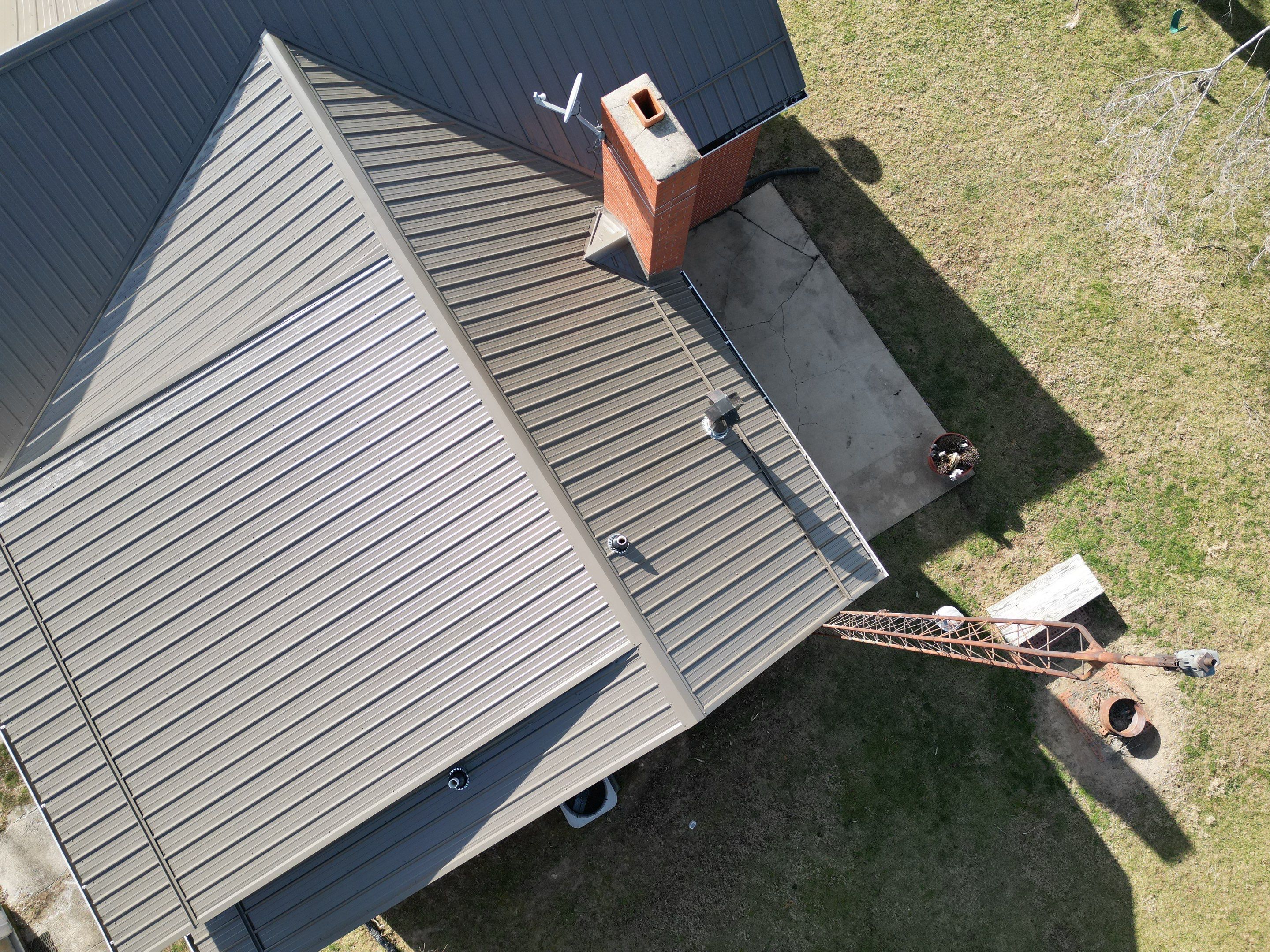 Residential Roofing Installation using Performance Panel Metal - Burnished Slate by RoofX 