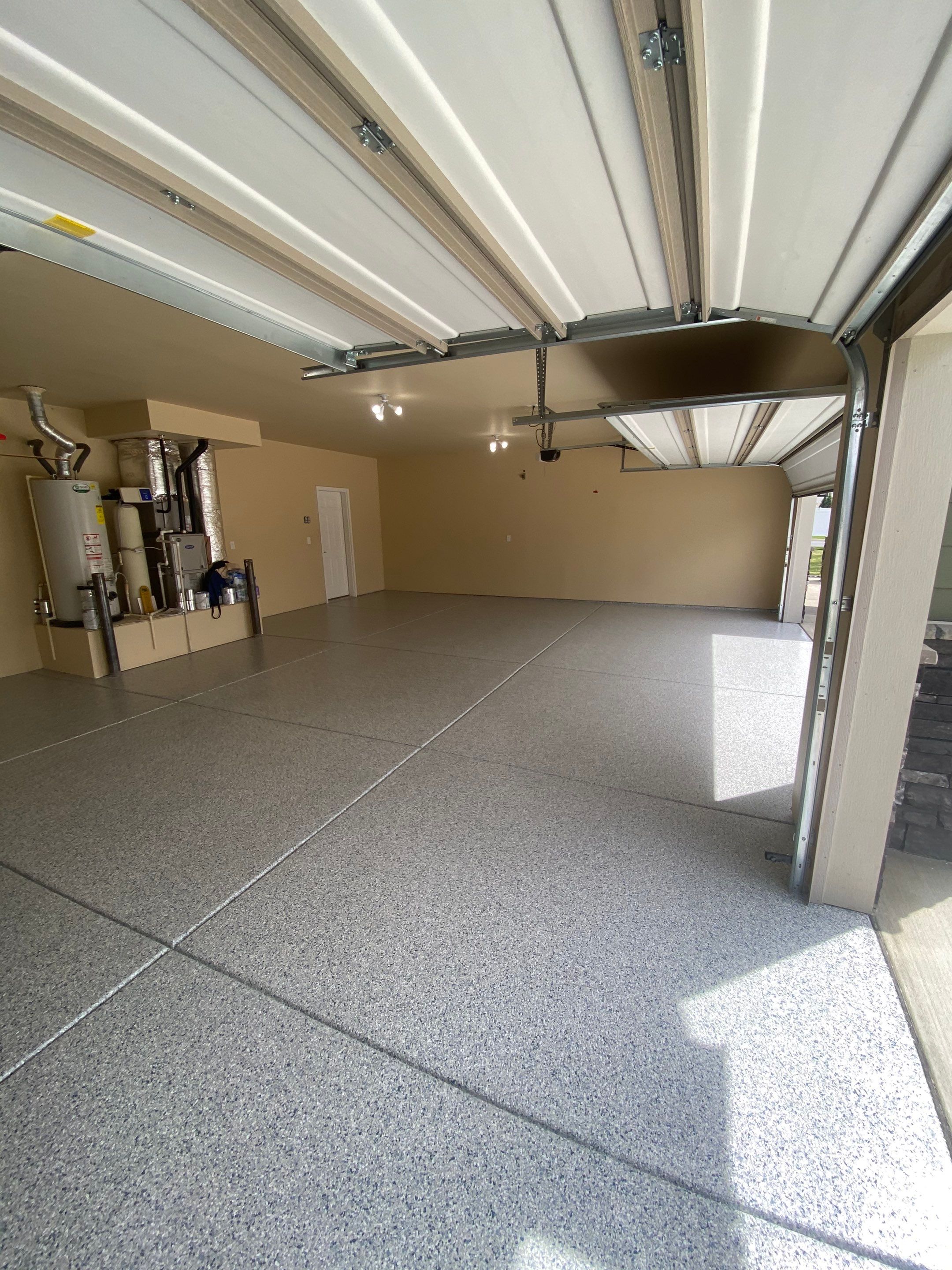 Driveway using Greystone 1/8" by Croc Coatings, LLC