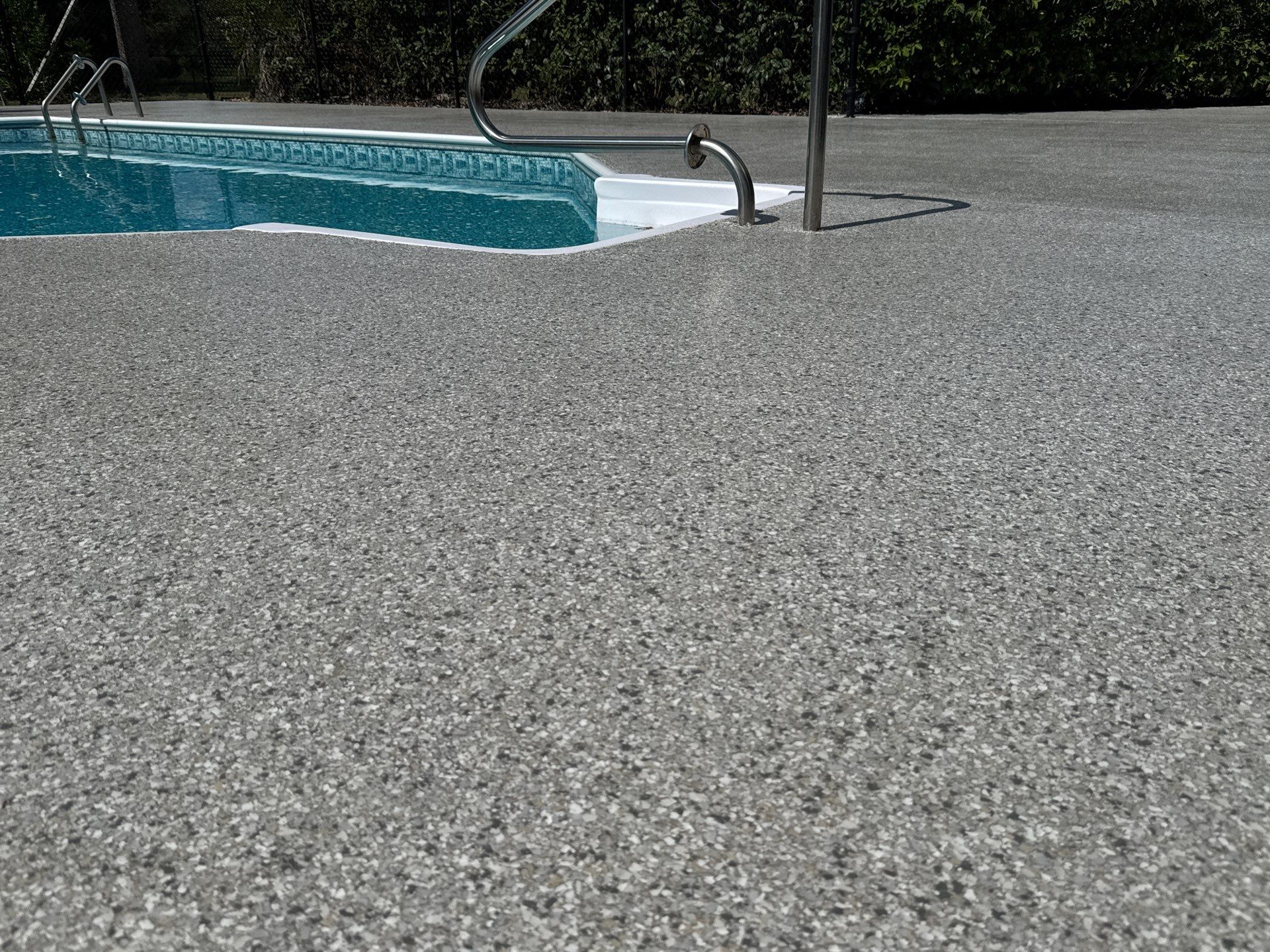 Pool Deck in Lake City, FL in Mount Everest by Cross Creek Concrete Coatings