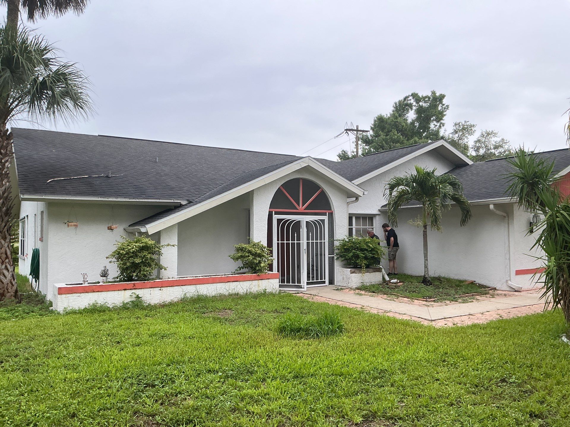 White Seamless Gutters with Splash Guards in North Fort Myers FL by Gutter Professor   by Gutter Professors