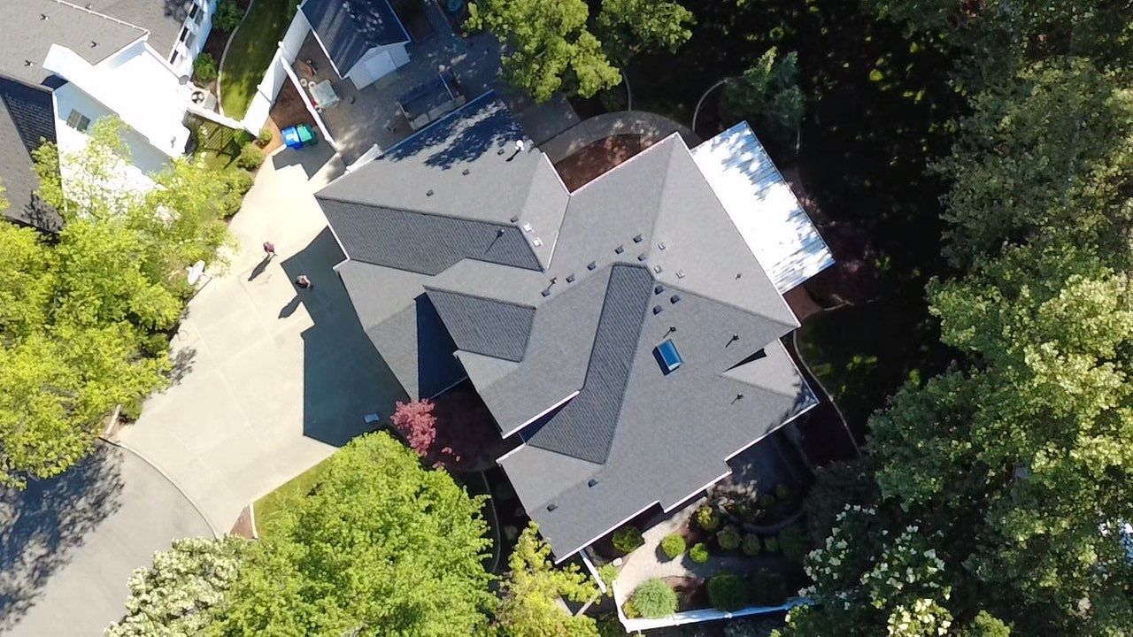 Asphalt Shingle Roof Replacement and Skylight Installation in Spokane Valley S Bannen Ct Spokane Valley WA 99037  The Denali System - Certainteed Landmark® Shingle- Moire Black by Alpine Roofing