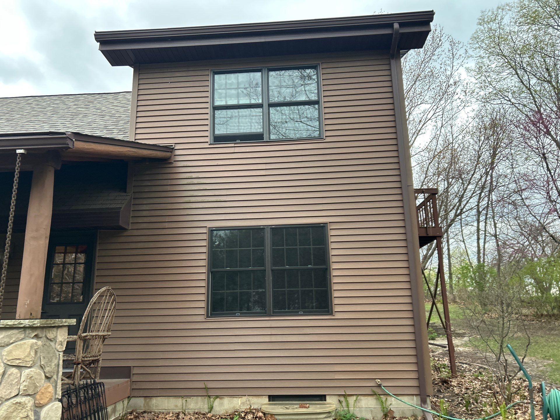 Pella Window installation using Pella Lifestyle wood/Aluminum window by United Windows and Siding LLC