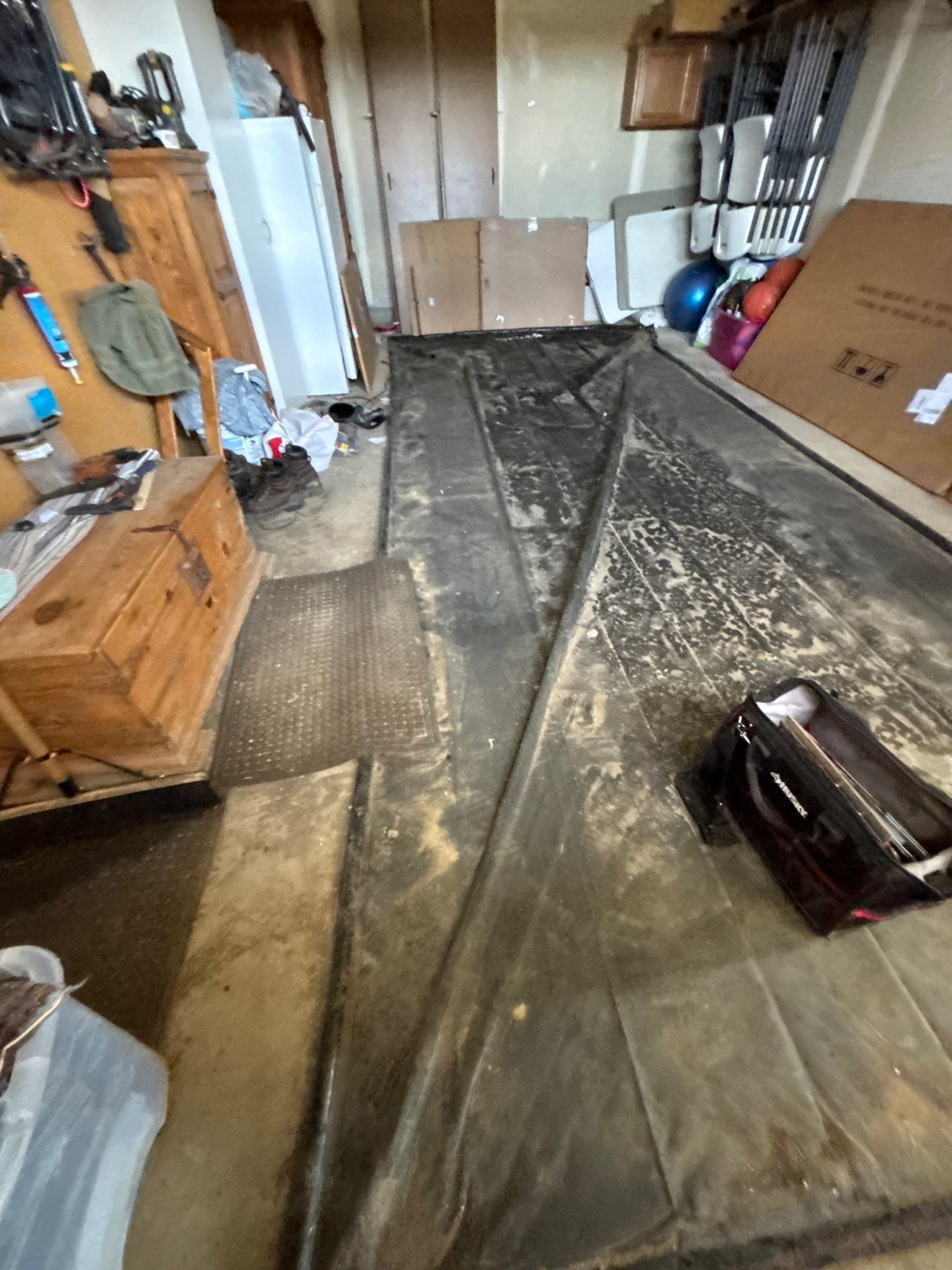 Speckled Epoxy Floor Coating Installation for Centerville Residential Garage by Select Painting, Coatings & Garage Cabinets