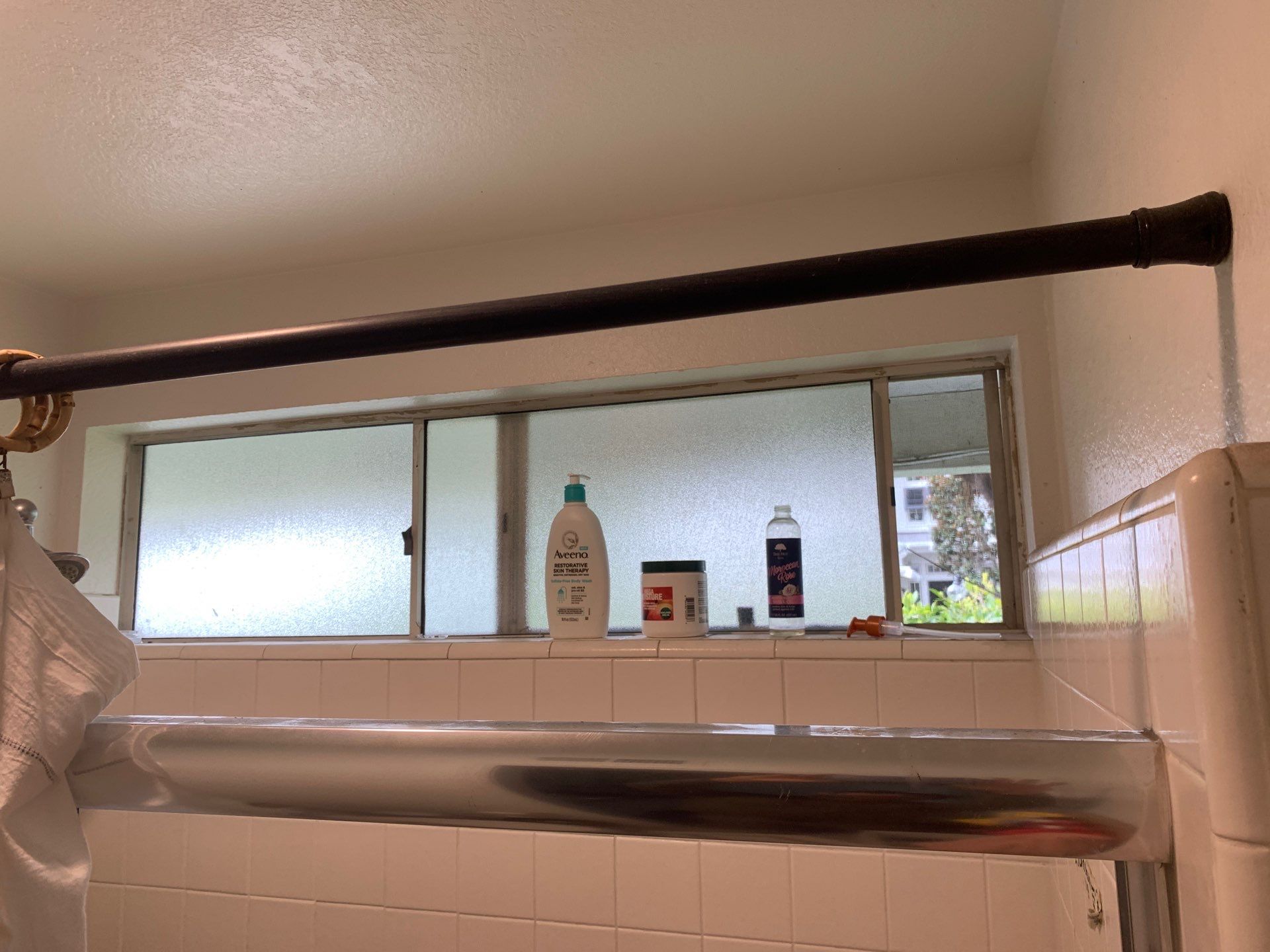 Window Installation using Milgard black vinyl windows by American Window Company